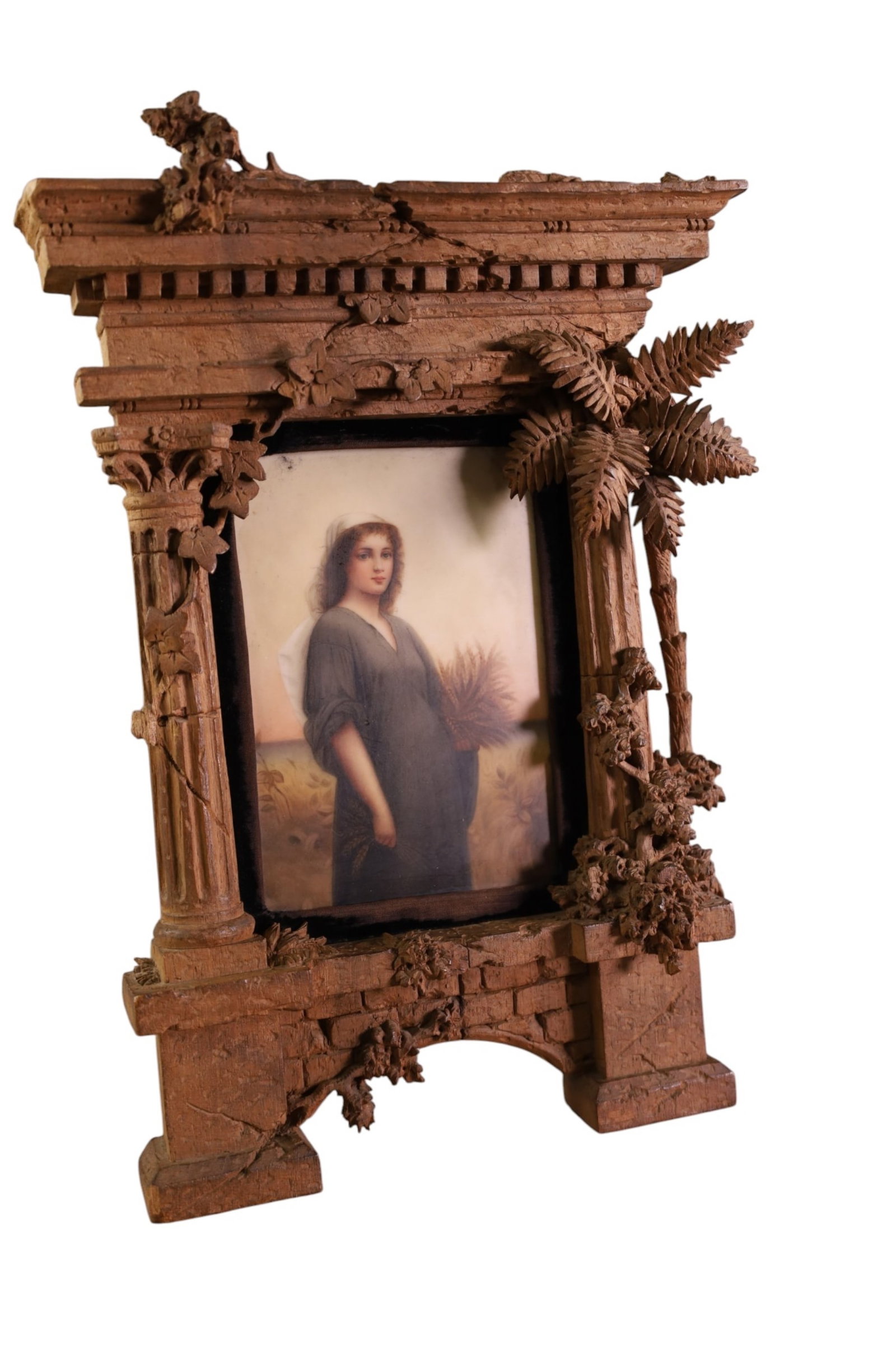 FRAMED PORCELAIN PLAQUE: TABLE TOP, ORNATE CARVED FRAME, WITH PORCELAIN PLAQUE. DAMAGE TO FRAME. 5" x 7" PLAQUE & 9" x 13" IN FRAME