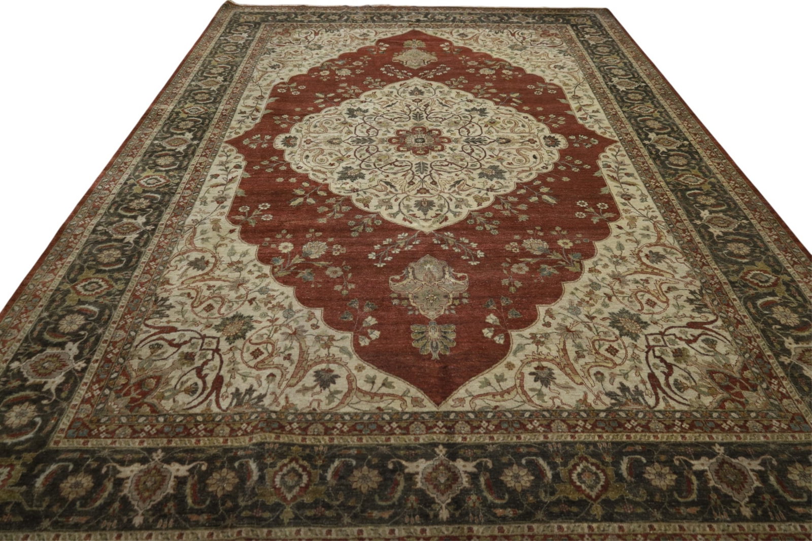 APPROX 10' x 13' 8" HANDMADE WOOL RUG: HANDMADE WOOL RUG.