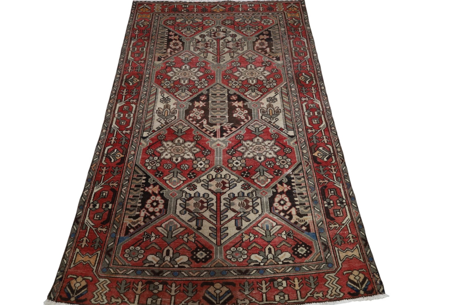 APPROX 4' 4 x 6' 9" HANDMADE WOOL RUG: BAKHTIARI HANDMADE WOOL RUG