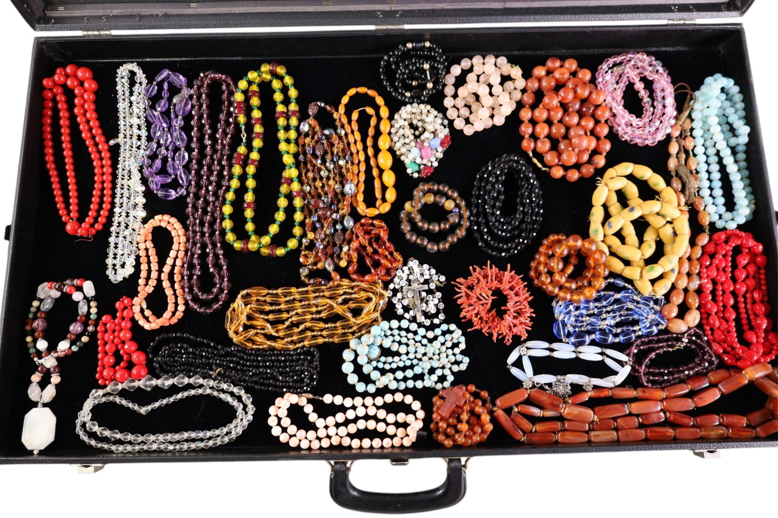 COLLECTION OF BEADED NECKLACES & ROSARYS: TURQUOISE, CORAL, GLASS, AND MORE. SHOWCASE NOT INCLUDED.