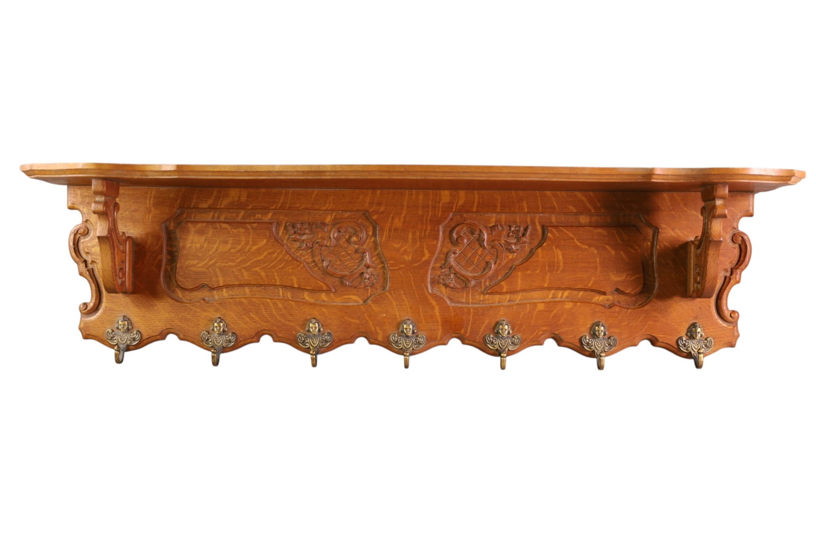 ANTIQUE CARVED OAK WALL SHELF: OAK WALL SHELF, HAT RACK. 45" W x 7 1/2" D x 13" H. THIS ITEM EXCEEDS SIZE LIMITATIONS FOR IN HOUSE SHIPPING, MUST BE PICKED UP IN HOUSE OR SHIPPED VIA 3rd PARTY GROUND SHIPPER.