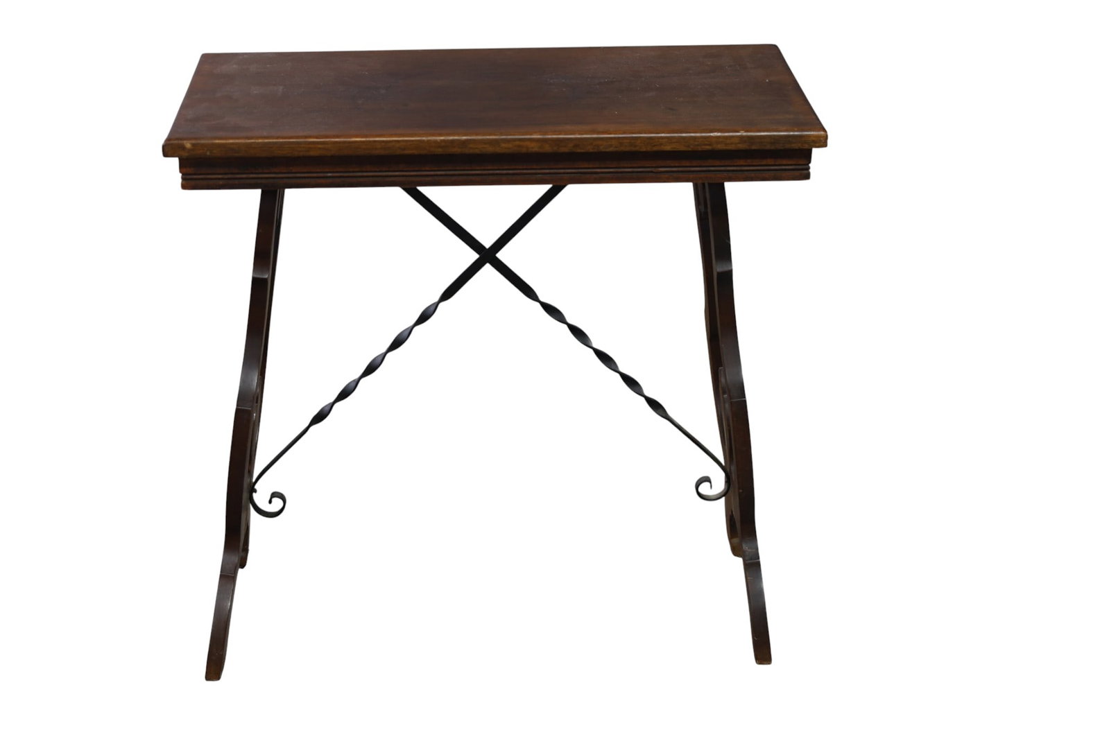 1920'S SPANISH STYLE SIDE TABLE: IRON TRESTLE BASE, SPANISH STYLE SIDE TABLE. REPAIR TO LEG. 26" L x 13" D x 26" H. THIS ITEM EXCEEDS SIZE LIMITATIONS FOR IN HOUSE SHIPPING, MUST BE PICKED UP IN HOUSE OR SHIPPED VIA 3rd PARTY GROUND