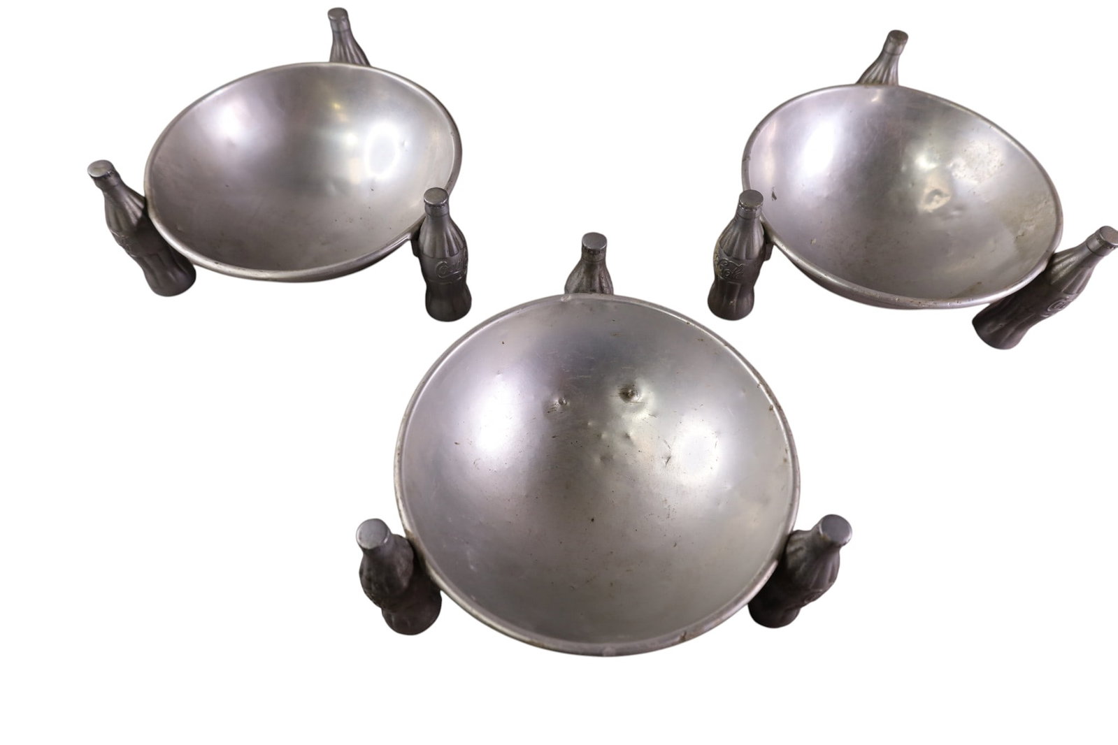 3 COCA COLA PRETZEL DISHES: 3 ALUMINUM COCA COLA PRETZEL DISHES. DENTS. 8" DIAM.