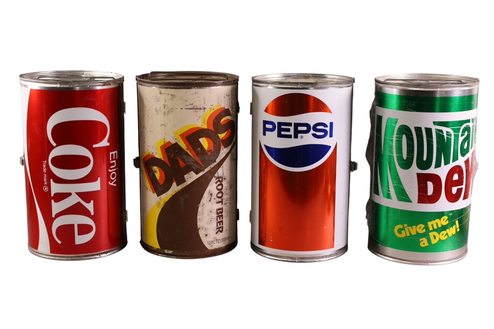 4 SODA CAN BARBEQUES: DADS ROOT BEER, COCA COLA, MOUNTAIN DEW, PEPSI COLA. COKE IS NEW OLD STOCK. PAINT LOSS SCRATCHES. 8" DIAM x 14" H. THIS ITEM EXCEEDS SIZE LIMITATIONS FOR IN HOUSE SHIPPING, MUST BE PICKED UP IN HOUSE
