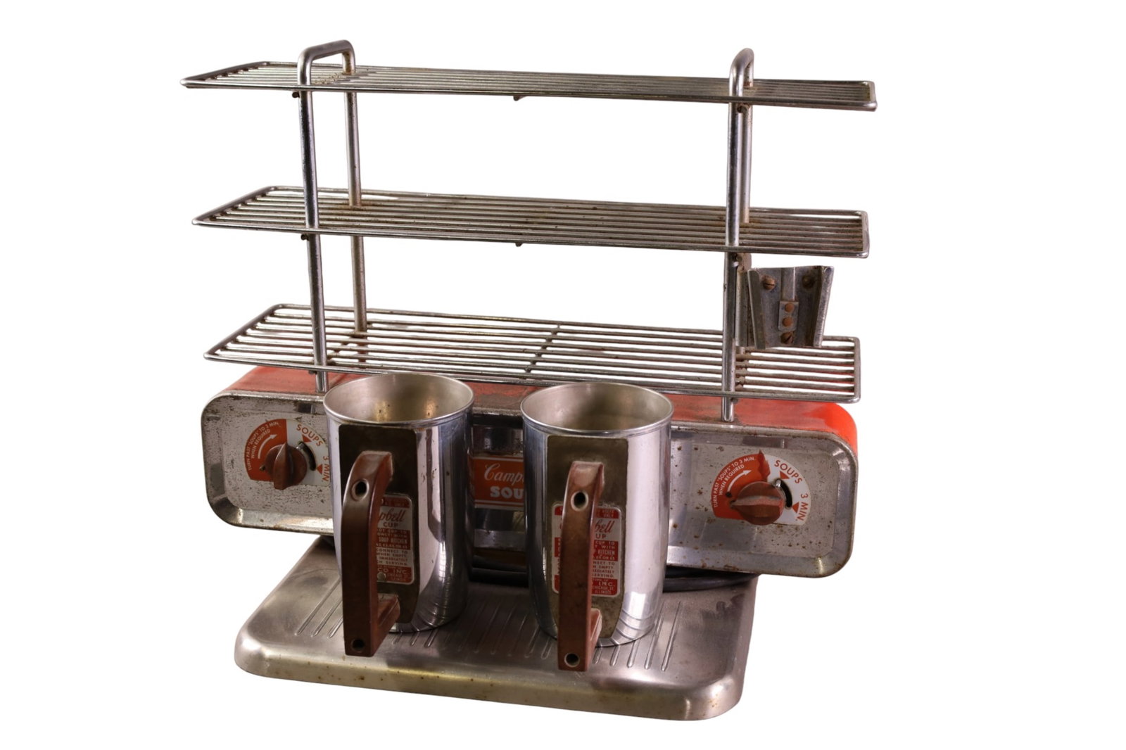 CAMPBELLS SOUP DISPENSER: HOT CUP CAMPBELLS SOUP COUNTER TOP DISPENSER. 18 1/2" W x 15 1/2" H. THIS ITEM EXCEEDS SIZE LIMITATIONS FOR IN HOUSE SHIPPING, MUST BE PICKED UP IN HOUSE OR SHIPPED VIA 3rd PARTY GROUND SHIPPER.