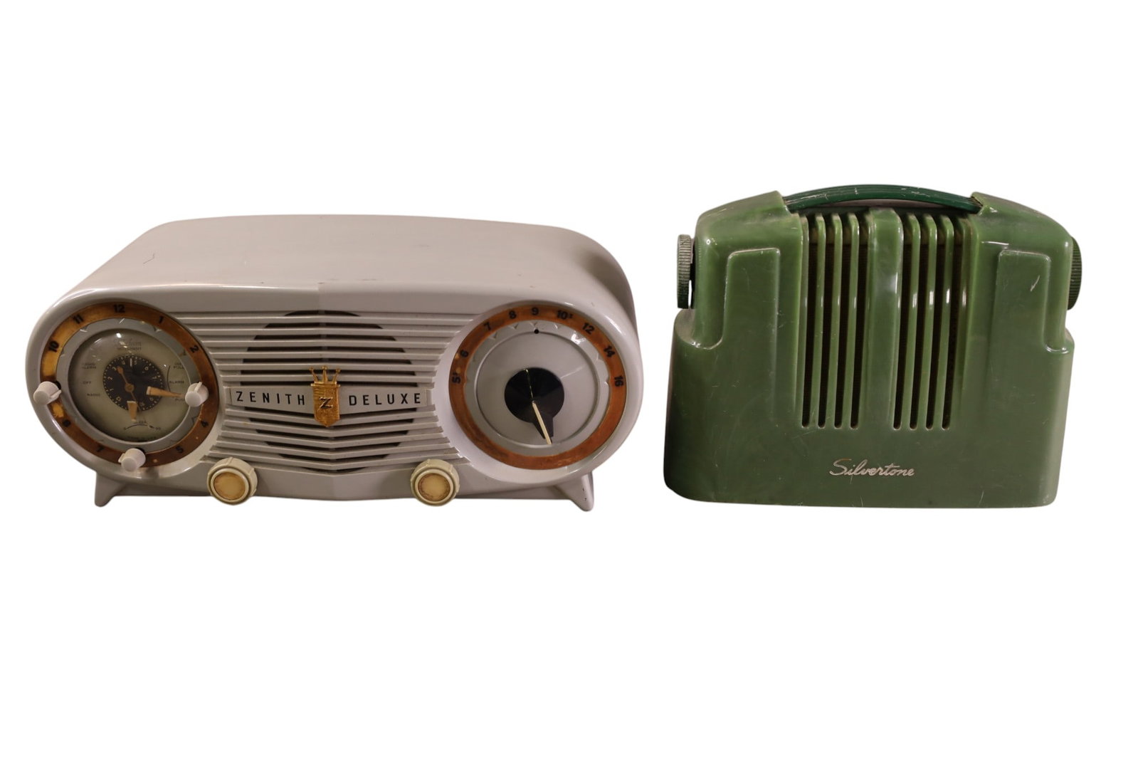 2 VINTAGE RADIOS: SILVERTONE MODEL 210 GREEN PLASTIC RADIO, ZENITH DELUXE MODEL 6J03. ALL RADIOS ARE SOLD AS IS WE DO NOT GUARANTEE WORKING ORDER.