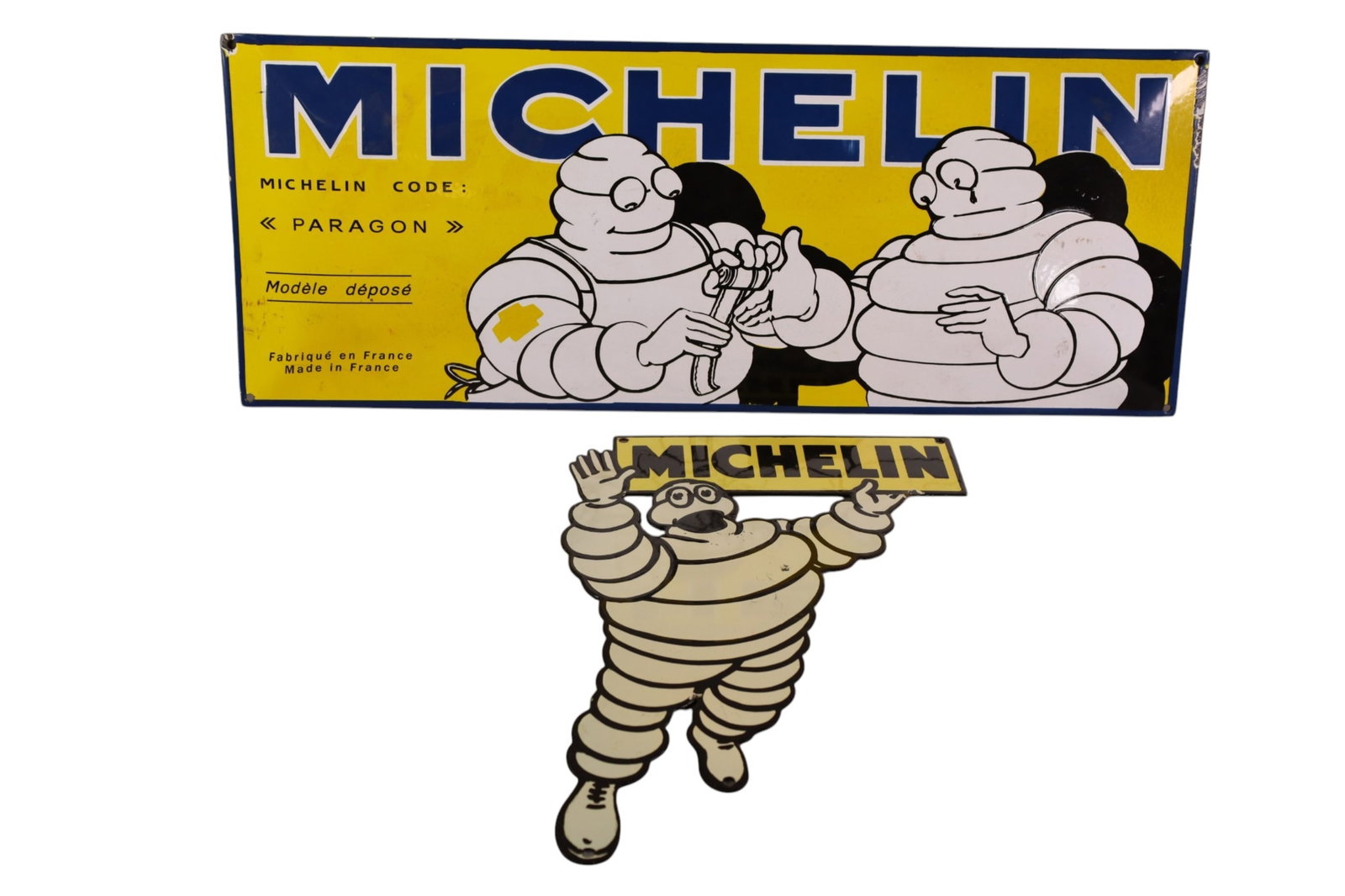 2 MICHELIN FANTASY SIGNS: 2 PORCELAIN MICHELIN TIRE FANTASY SIGNS, 27 1/2" x 10 1/2" & 17" H.