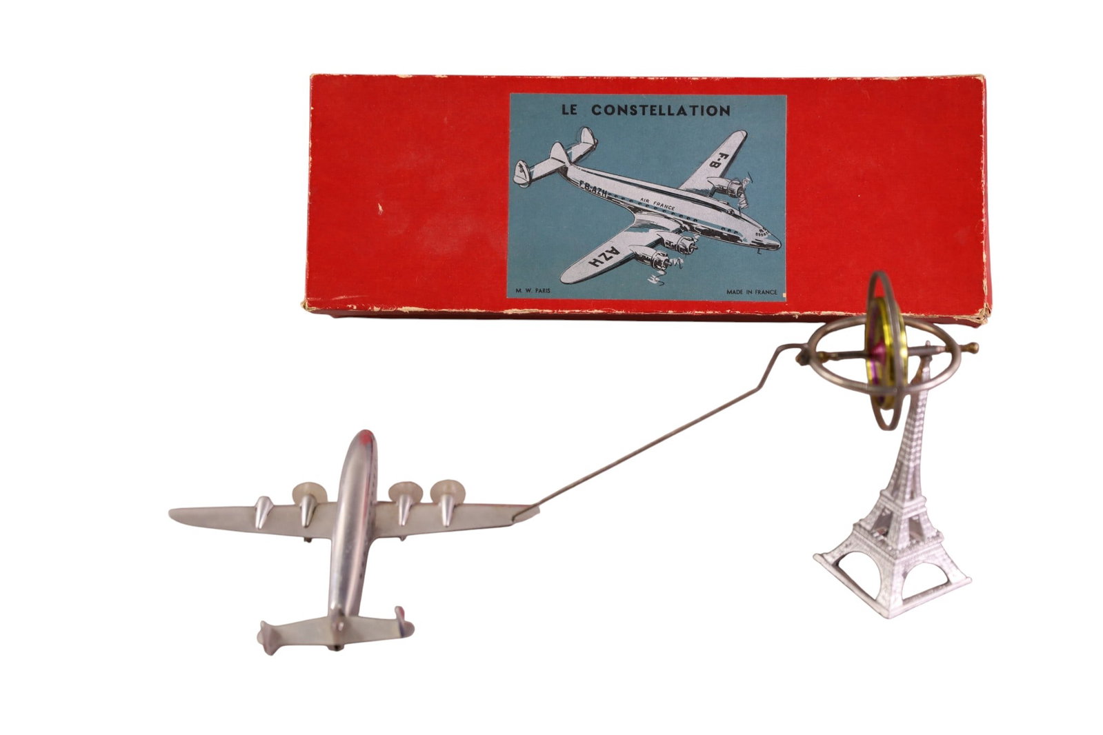 LE CONSTELLATION AIRPLANE TOY: FRENCH AIRPLANE TOY, AIR FRANCE. IN ORIGINAL BOX. MISSING ONE PROP.