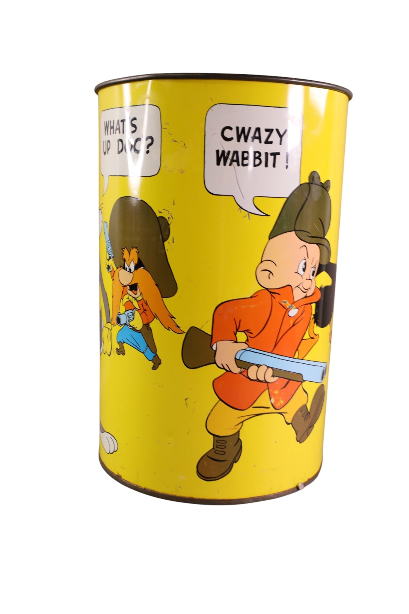 WARNER BROS. WASTE BASKET: TIN WASTE BASKET, MARKED WARNER BROS. SCRATCHES. 16" H.