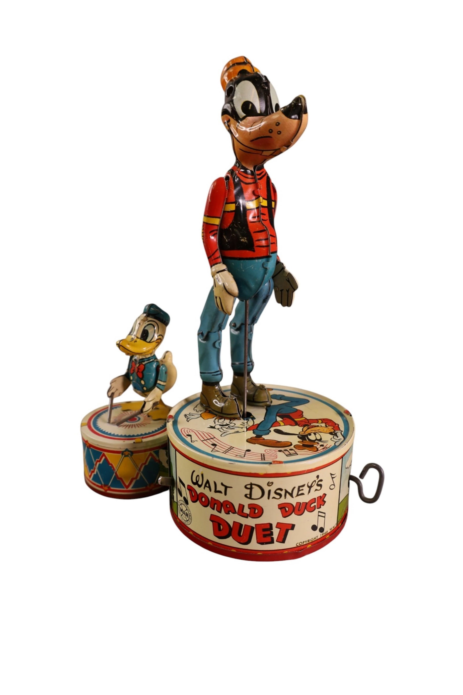 MARX DONALD DUCK DUET: 1946 MARX WALT DISNEYS DONALD DUCK DUET, WIND UP. DAMAGE TO ONE EAR. 10" H.