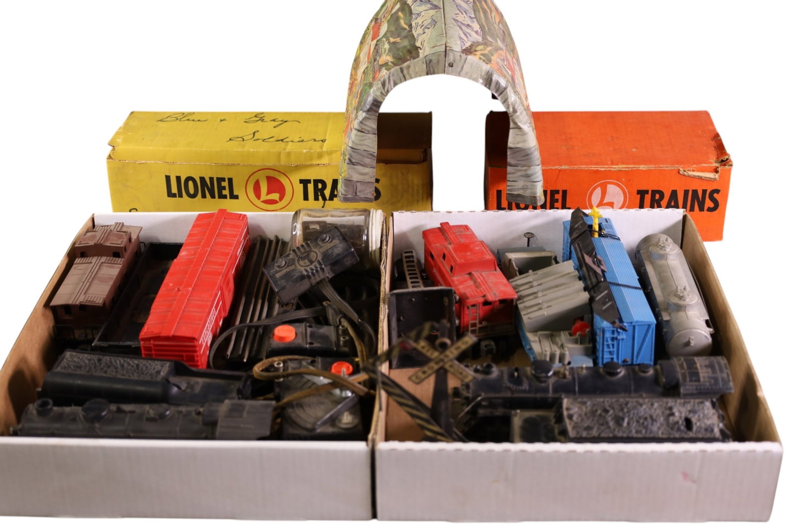LARGE GROUPING OF LIONEL TRAINS: 2 PARTIAL SETS, ENGINE 245 & ENGINE 1666. TRANSFORMER, AND ACCESSORIES. PLAYED WITH CONDITION.