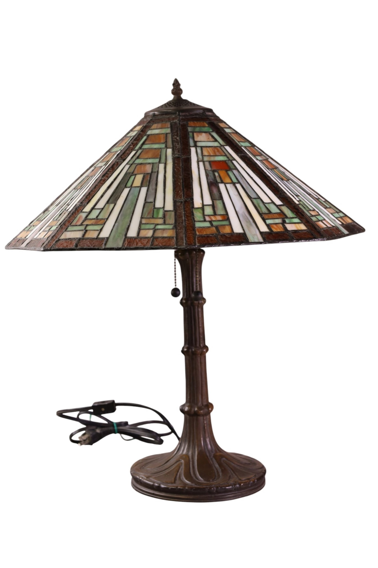LEADED GLASS TABLE LAMP: CONTEMPORARY LEADED GLASS TABLE LAMP. SLIGHT LEAN. 21" W x 23" H. THIS ITEM EXCEEDS SIZE LIMITATIONS FOR IN HOUSE SHIPPING, MUST BE PICKED UP IN HOUSE OR SHIPPED VIA 3rd PARTY GROUND SHIPPER.