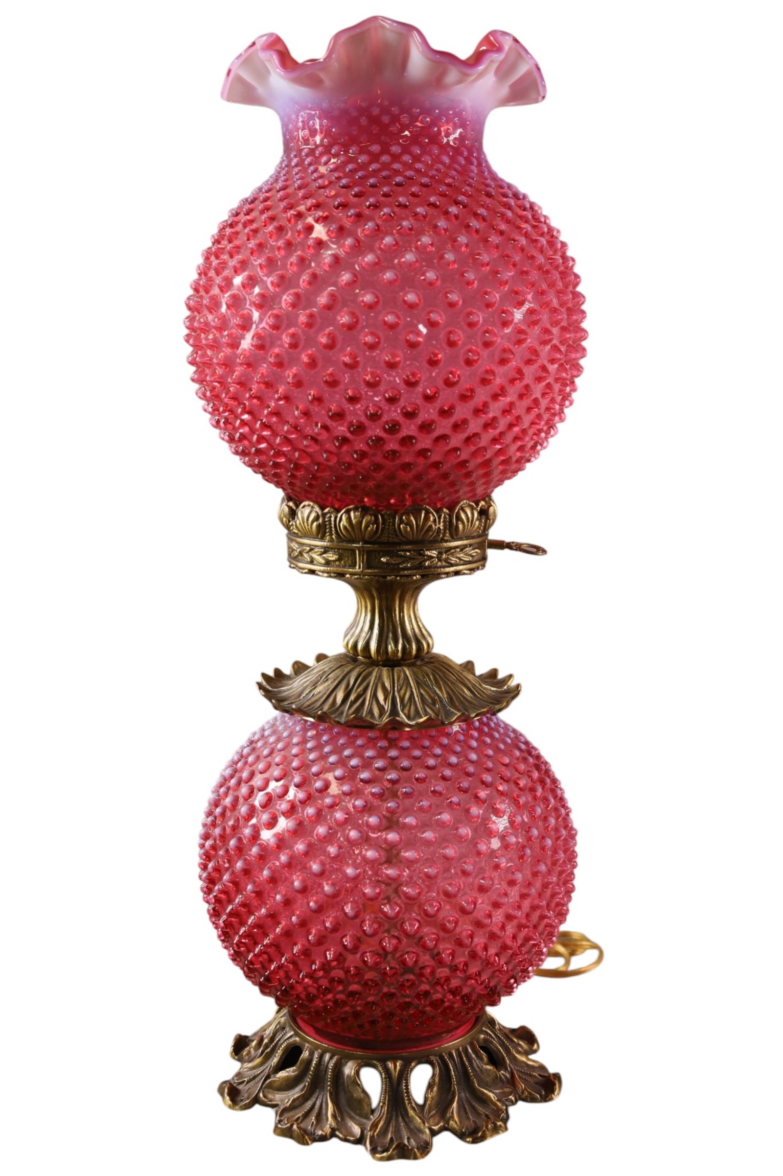 CRANBERRY FENTON LAMP: CRANBERRY HOBNAIL TABLE LAMP. SINGLE SOCKET. 8" DIAM x 23" H. THIS ITEM EXCEEDS SIZE LIMITATIONS FOR IN HOUSE SHIPPING, MUST BE PICKED UP IN HOUSE OR SHIPPED VIA 3rd PARTY GROUND SHIPPER.