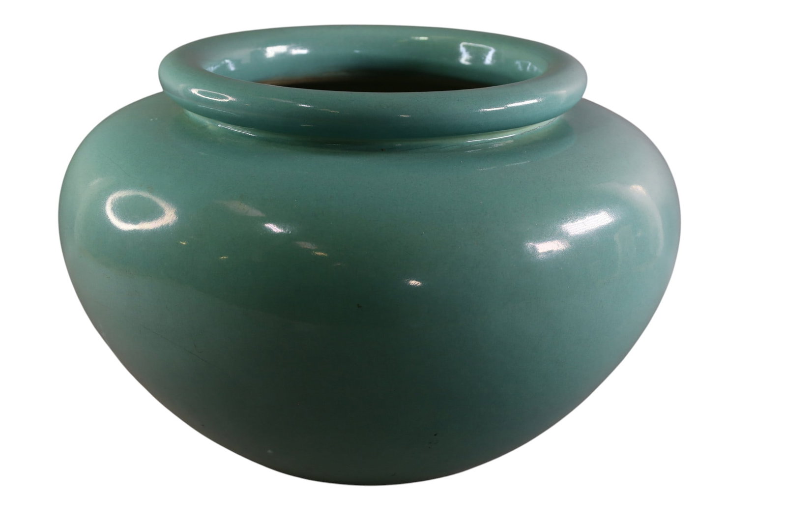 PACIFIC POTTERY PLANTER: GREEN GLAED PACIFIC POTTERY PLANTER, 17" DIAM x 11" H. THIS ITEM EXCEEDS SIZE LIMITATIONS FOR IN HOUSE SHIPPING, MUST BE PICKED UP IN HOUSE OR SHIPPED VIA 3rd PARTY GROUND SHIPPER.