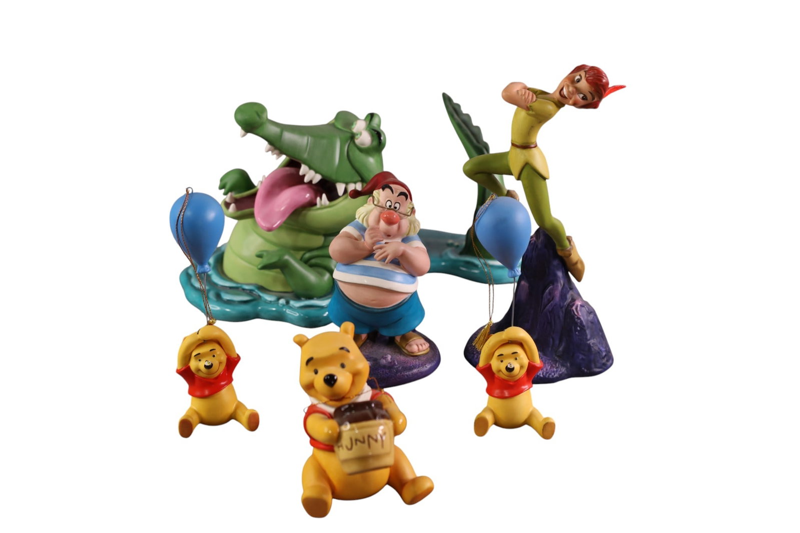 6 WALT DISNEY FIGURES: WINNIE THE POOH, PETER PAN, TIC TOC CROC, MR. SMEE. WALT DISNEY CLASSICS. 5 TO 8"H. ALL WITH BOXES.