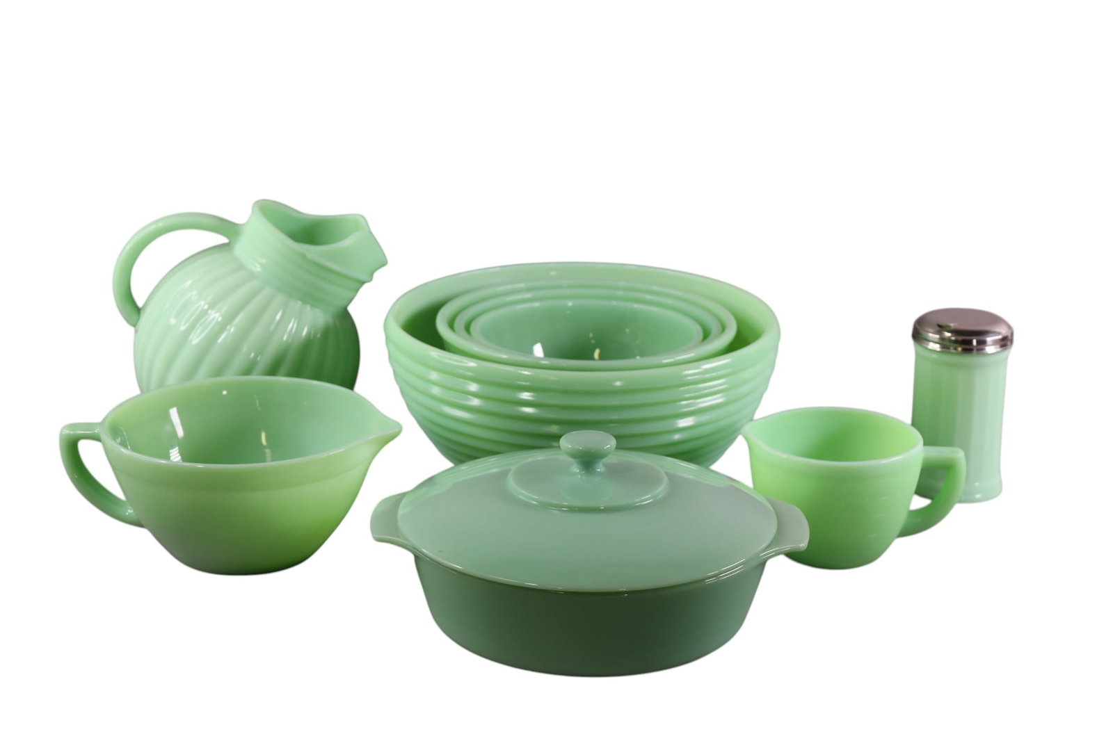 9 PIECES JADITE: BOWLS, COVERED DISH, SUGAR SHAKER, WATER PITCHER AND MORE. MOST IS VINTAGE. 3 TO 12"W