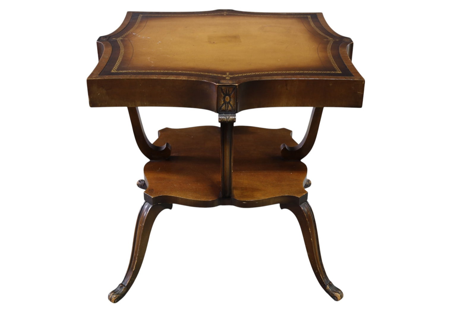 LEATHER TOP LAMP TABLE: TWO TIER LEATHER TOP LAMP TABLE, WEAR TO FINISH. DAMAGE TO LEATHER. 30" x 30" x 28 1/2" H. THIS ITEM EXCEEDS SIZE LIMITATIONS FOR IN HOUSE SHIPPING, MUST BE PICKED UP IN HOUSE OR SHIPPED VIA 3rd