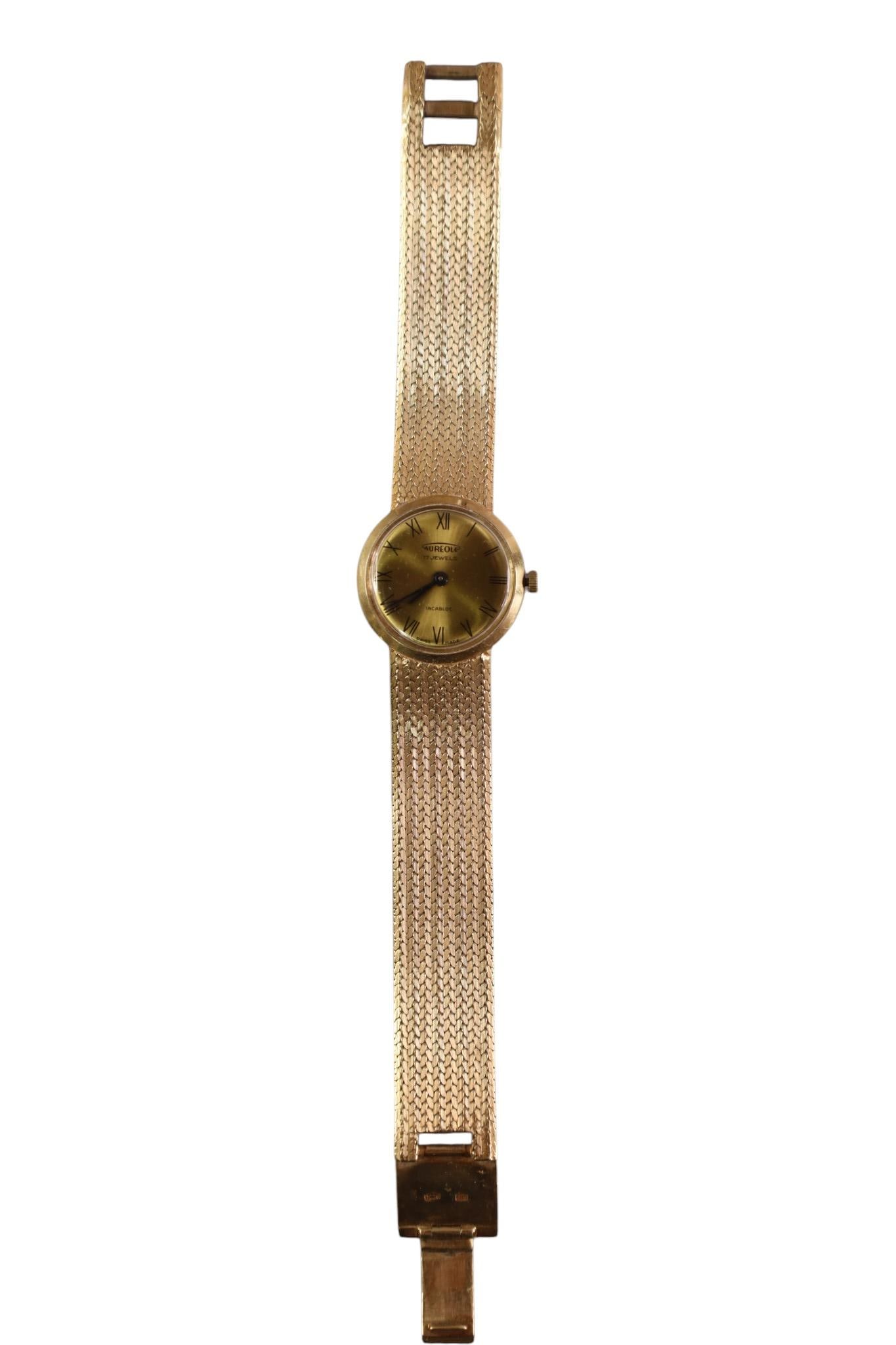 14K GOLD AUREOLE WATCH: 14K GOLD LADY'S AUREOLE WATCH, 17 JEWEL, SWISS MOVEMENT, 49 GRAMS TOTAL.
