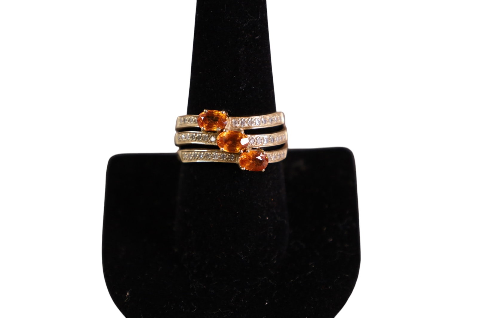 14K GOLD RING: 14K GOLD RING WITH ORANGE STONES AND DIAMONDS, TRIPLE BAND 14K GOLD. SIZE 9.5. APPROX 6 GRAMS.