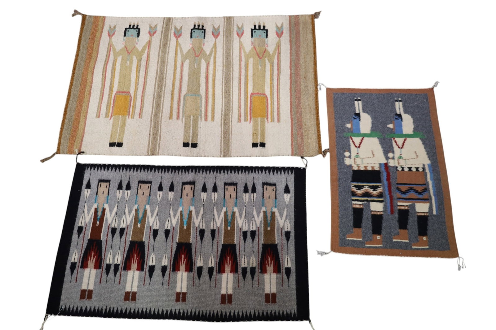 3 NAVAJO YEI RUGS: 3 SMALL HANDMADE NATIVE AMERICAN NAVAJO YEI RUGS. 18" - 42" W.