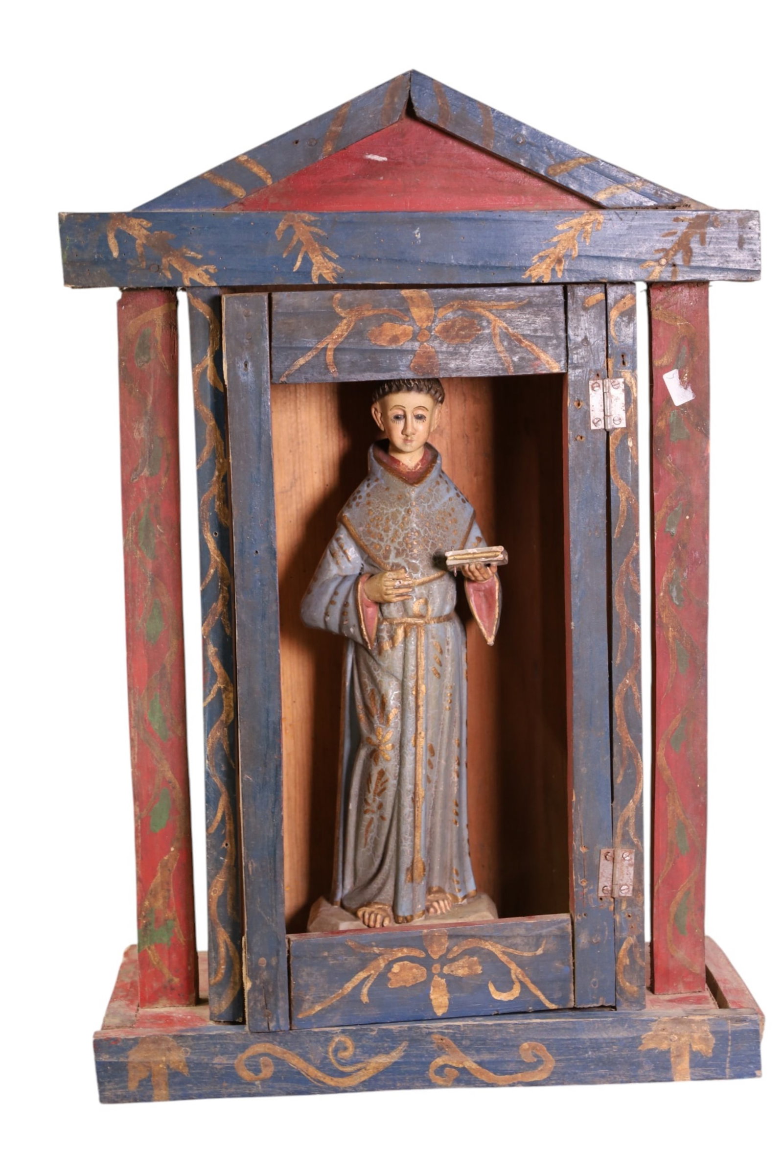 SANTO FIGURE IN SHRINE: RELIGIOUS SANTO FIGURE IN SHRINE POLYCHROME PAINTED. 14" W X 21" H. THIS ITEM EXCEEDS SIZE LIMITATIONS FOR IN HOUSE SHIPPING, MUST BE PICKED UP IN HOUSE OR SHIPPED VIA 3rd PARTY GROUND SHIPPER.