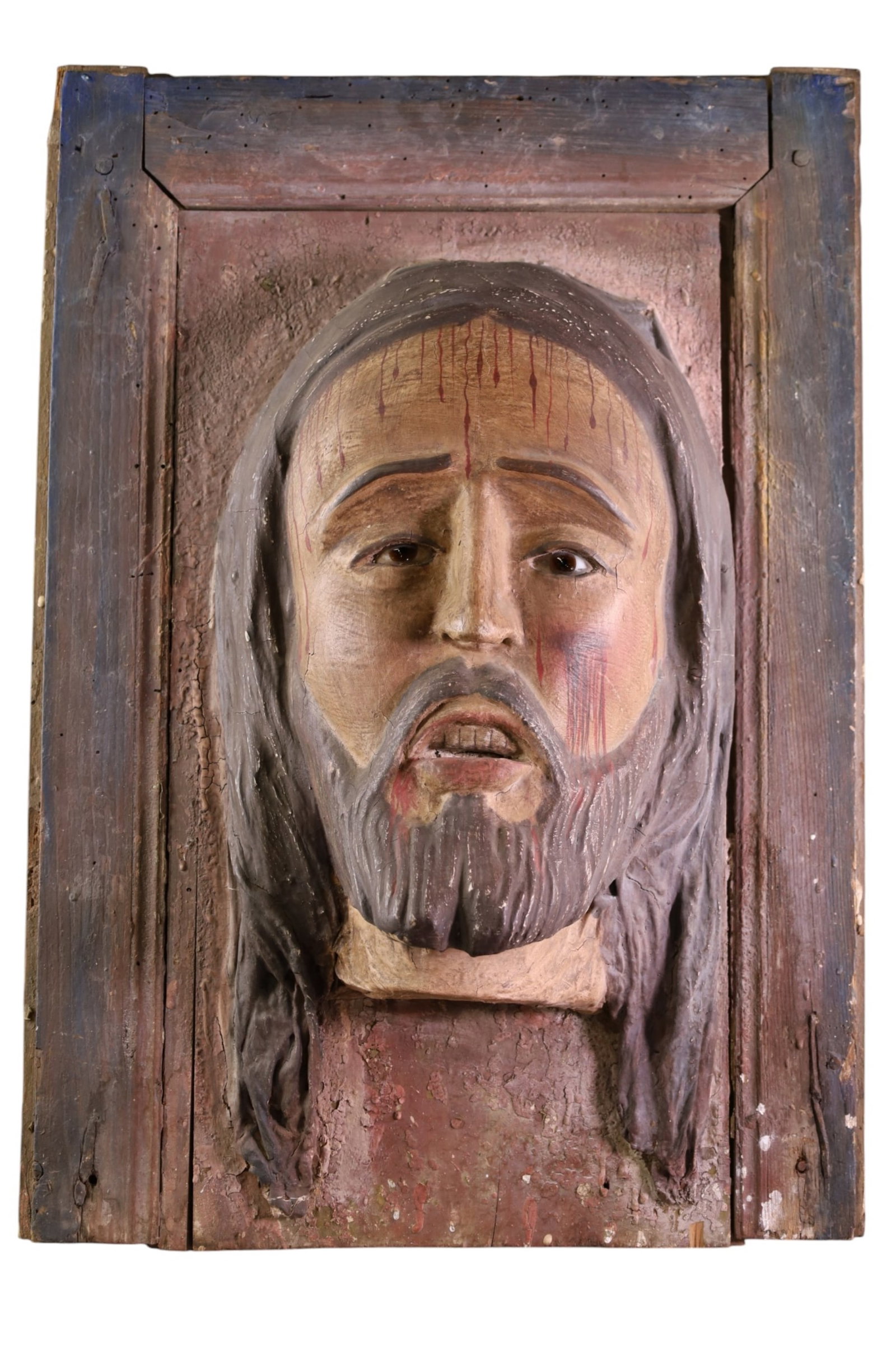 LARGE CARVED RELIGIOUS ICON: LARGE CARVED WOODEN RELIGIOUS ICON, GLASS EYES. 19" x 27" THIS ITEM EXCEEDS SIZE LIMITATIONS FOR IN HOUSE SHIPPING, MUST BE PICKED UP IN HOUSE OR SHIPPED VIA 3rd PARTY GROUND SHIPPER.