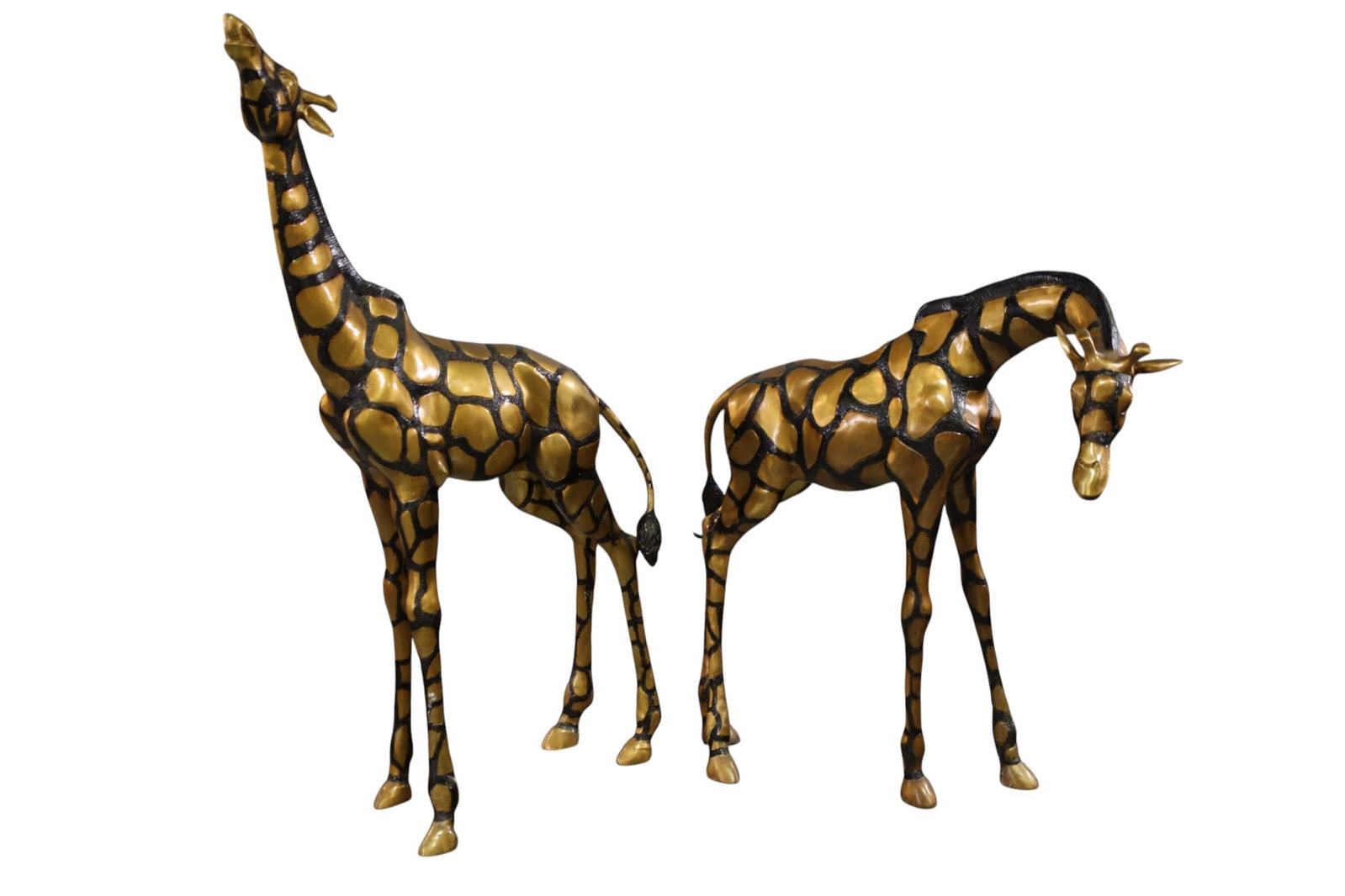 PAIR OF TALL BRONZE GIRAFFES: PAIR OF LARGE BRONZE GIRAFFE FIGURES, UNSIGNED, IN THE STYLE OF SERGIO BUSTAMONTE. 52" & 37" H. THIS ITEM EXCEEDS SIZE LIMITATIONS FOR IN HOUSE SHIPPING, MUST BE PICKED UP IN HOUSE OR SHIPPED VIA 3rd