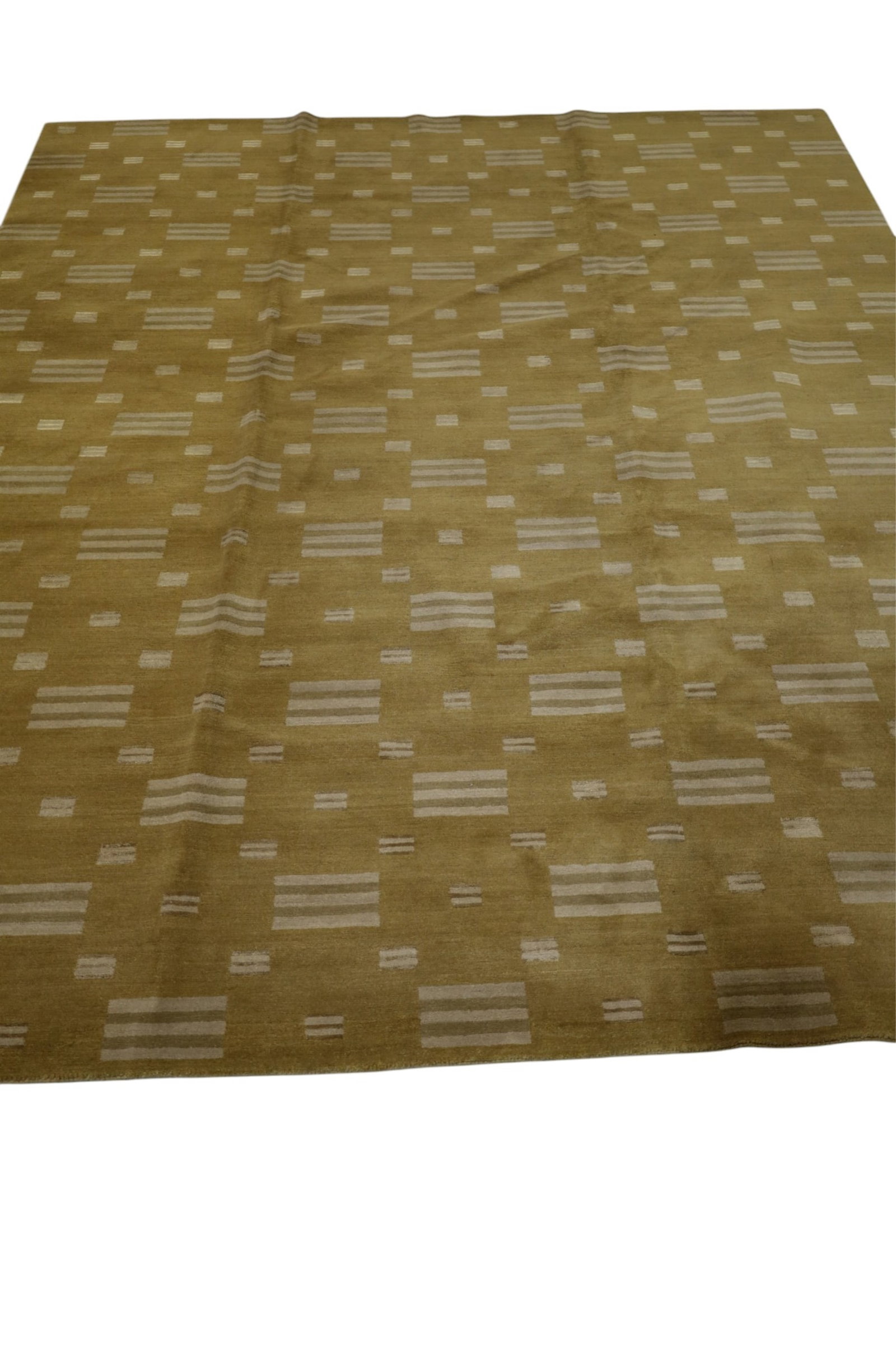 APPROX 8' 2" x 10' HANDMADE WOOL RUG: TIBETAN HAND WOVEN WOOL RUG. THIS ITEM EXCEEDS SIZE LIMITATIONS FOR IN HOUSE SHIPPING, MUST BE PICKED UP IN HOUSE OR SHIPPED VIA 3rd PARTY GROUND SHIPPER.