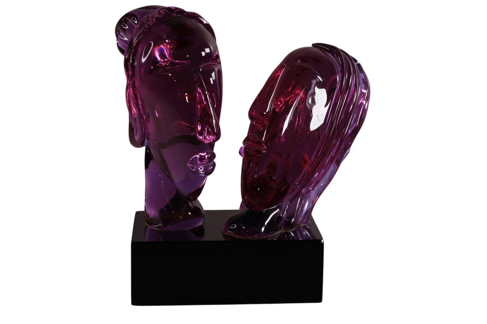 DOUBLE BUST GLASS SCULPTURE: ATTRIBUTED TO SERGIO ROSSI, ART GLASS SCULPTURE, CHIP TO ONE CORNER OF BASE. 9 1/4" W x 5 3/4" D BASE & 14" H. THIS ITEM EXCEEDS SIZE LIMITATIONS FOR IN HOUSE SHIPPING, MUST BE PICKED UP IN HOUSE OR