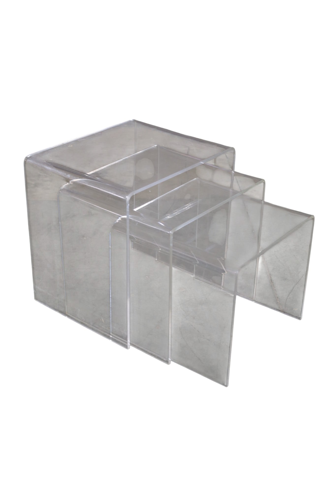 LUCITE NESTING TABLES: SET OF 3 LUCITE NESTING TABLES, HEAVY SCRATCHES. 16" x 13" x 16" THIS ITEM EXCEEDS SIZE LIMITATIONS FOR IN HOUSE SHIPPING, MUST BE PICKED UP IN HOUSE OR SHIPPED VIA 3rd PARTY GROUND SHIPPER.
