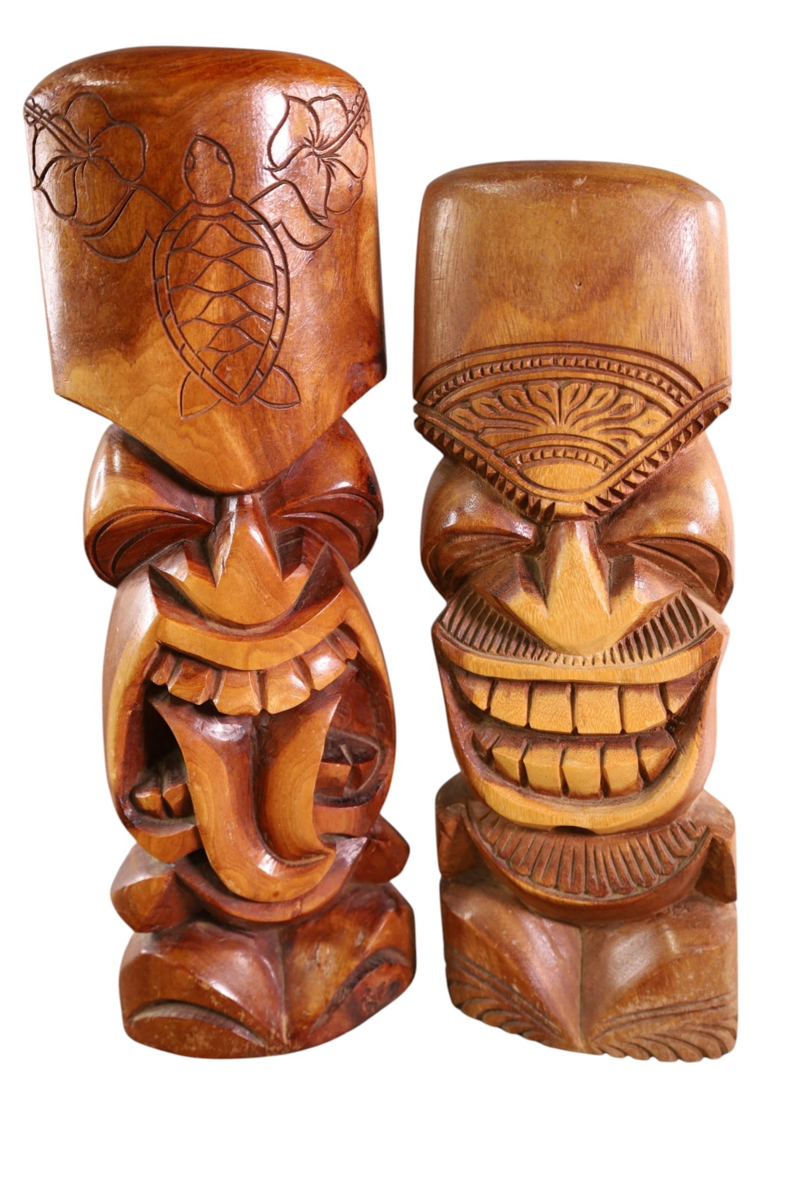 4 CARVED TIKIS - 4