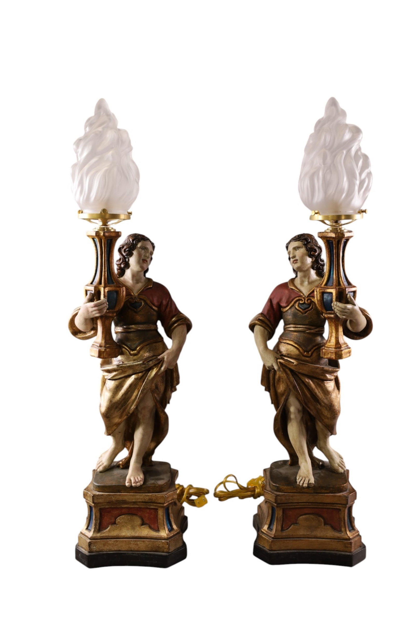 PAIR OF VENETIAN LAMPS: PAIR OF WOODEN CARVED, FIGURAL VENETIAN LAMPS, POLYCHROME PAINTED WITH GLASS FLAME SHADES. 31" H. THIS ITEM EXCEEDS SIZE LIMITATIONS FOR IN HOUSE SHIPPING, MUST BE PICKED UP IN HOUSE OR SHIPPED VIA