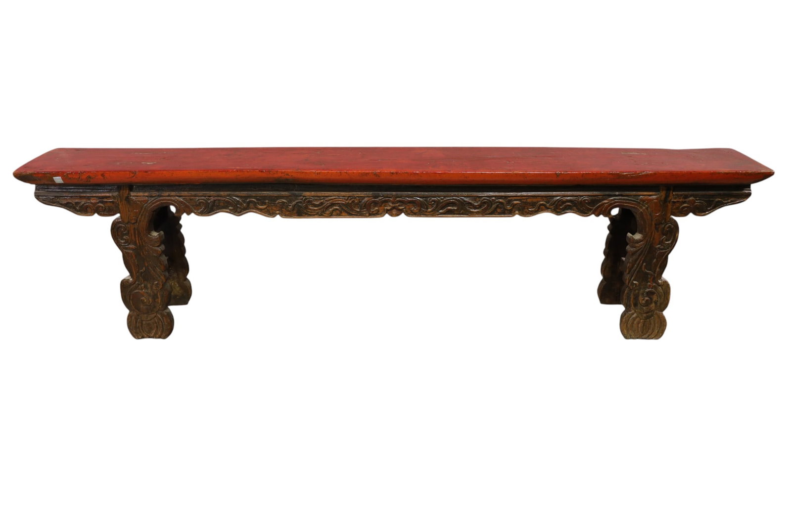 CHINESE BENCH: RED LACQUER BENCH, CARVED BASE. CONDITION IS CONSISTENT WITH AGE. 80" L x 11" D x 20" H. THIS ITEM EXCEEDS SIZE LIMITATIONS FOR IN HOUSE SHIPPING, MUST BE PICKED UP IN HOUSE OR SHIPPED VIA 3rd PARTY
