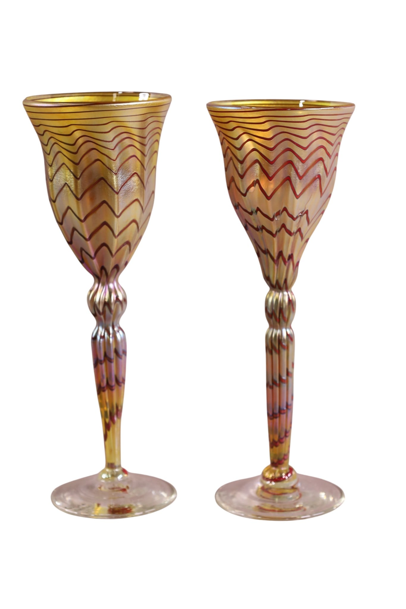 2 ART GLASS WINE GLASSES: HAND BLOWN IRIDESCENT ART GLASS WINE GLASSES, SIGNED AND DATED. 9 1/2" H.