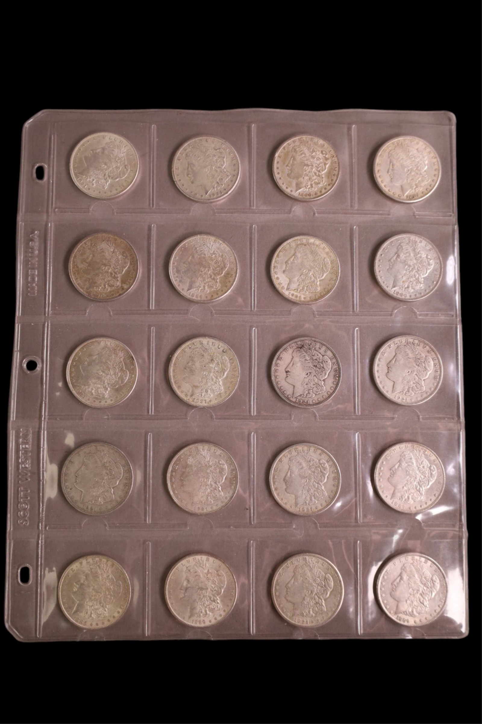 GROUPING OF 20 SILVER DOLLARS: GROUPING OF 20 SILVER DOLLARS, MORGAN DOLLARS. VARIOUS DATES.