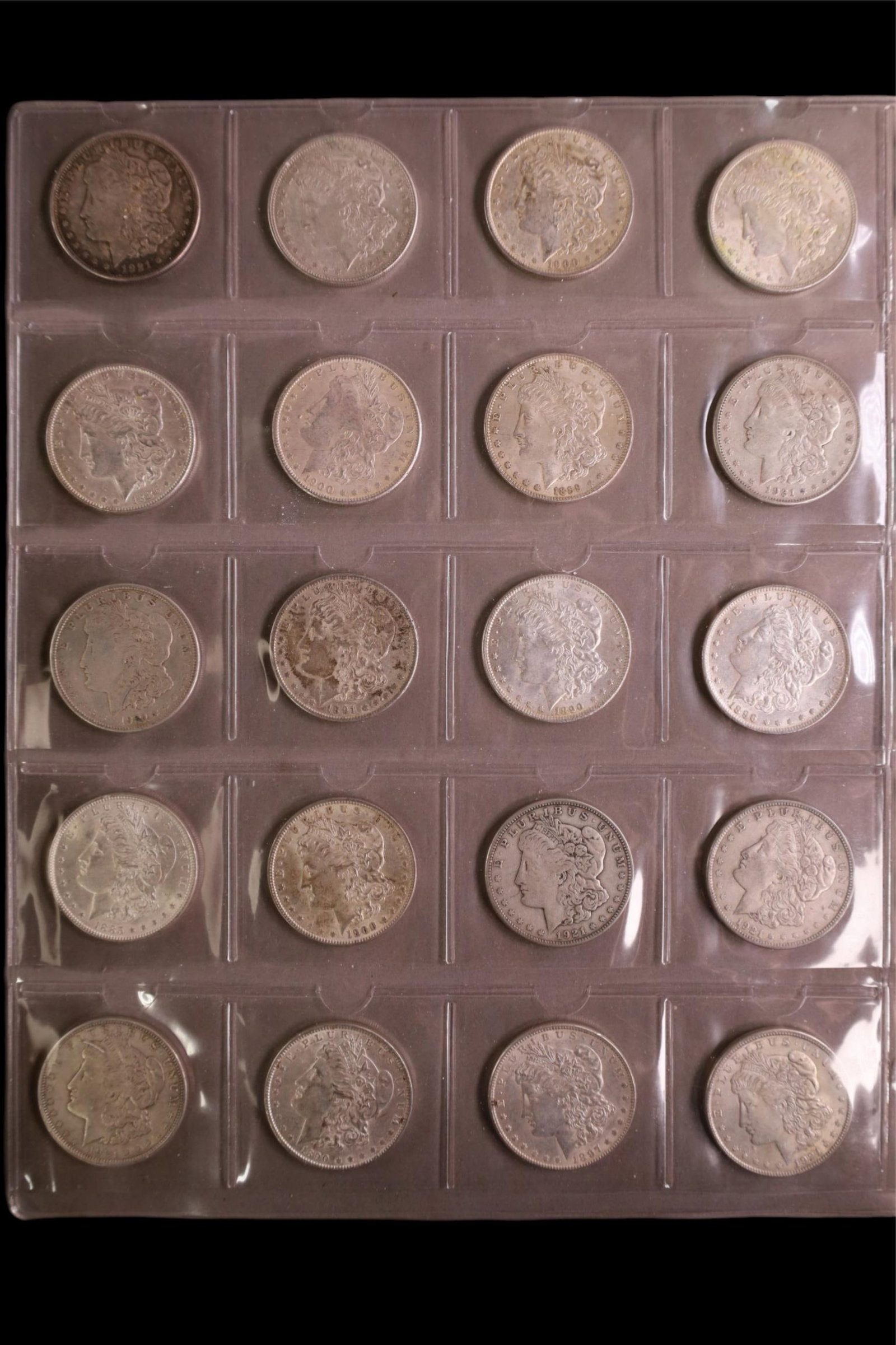 GROUPING OF 20 SILVER DOLLARS: GROUPING OF 20 SILVER DOLLARS, MORGAN DOLALRS, VARIOUS DATES.