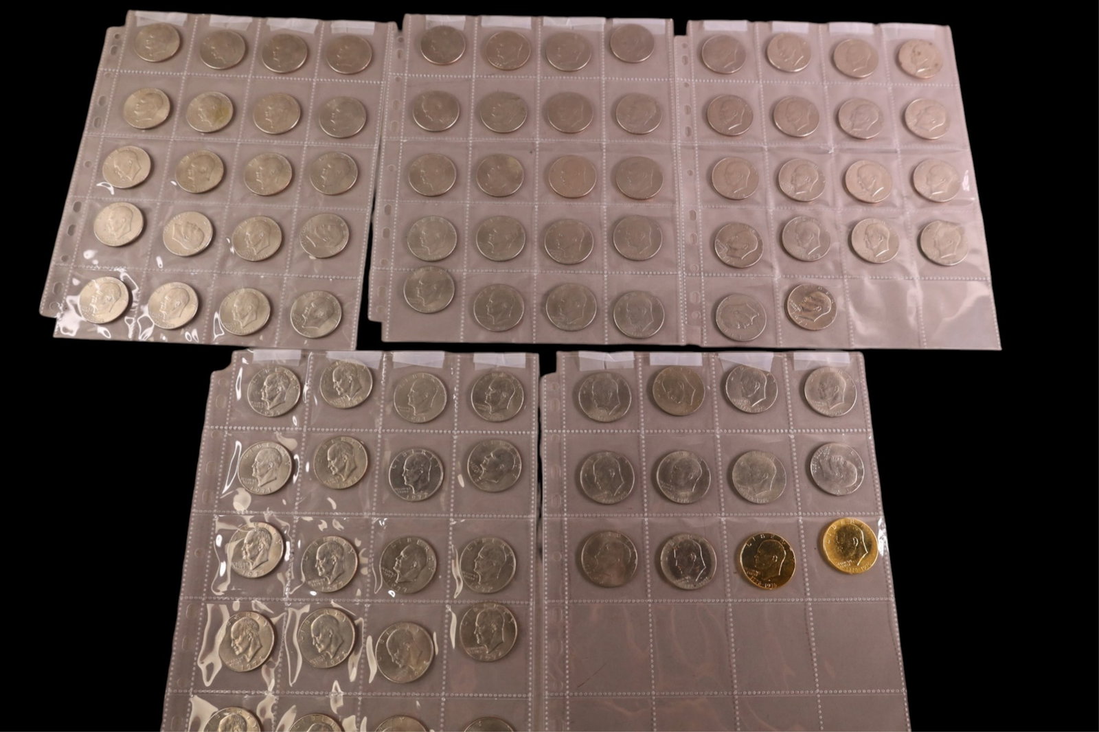 COLLECTION OF EISENHOWER DOLLARS: APPROX 89 BICENTENNIAL AND GOLD PLATED EISENHOWER DOLLARS.
