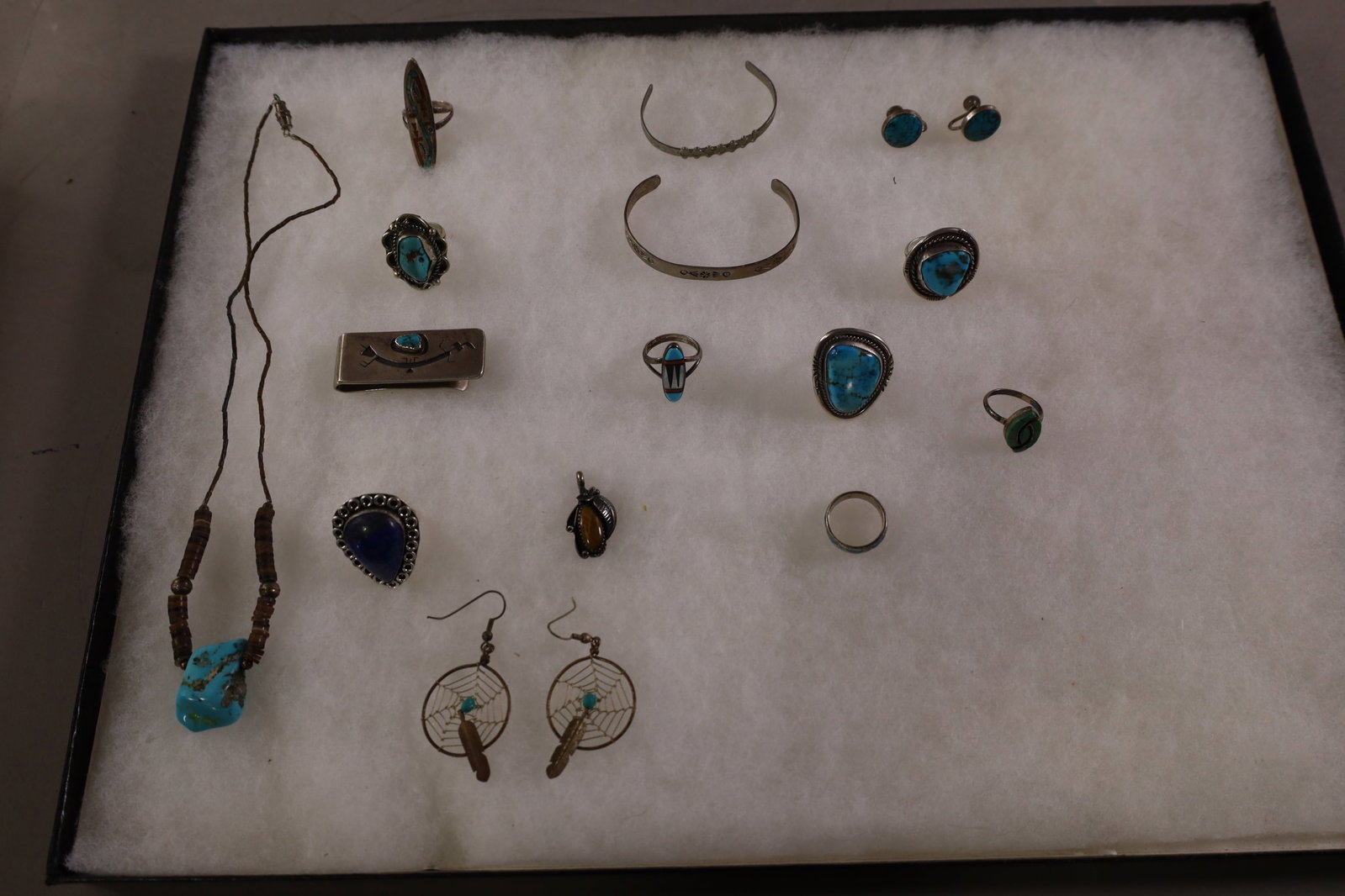GROUPING OF NATIVE AMERICAN JEWELRY: INCLUDING, EARRINGS, RINGS, AND MORE. SOME SIGNED. SHWOCASE NOT INCLUDED.