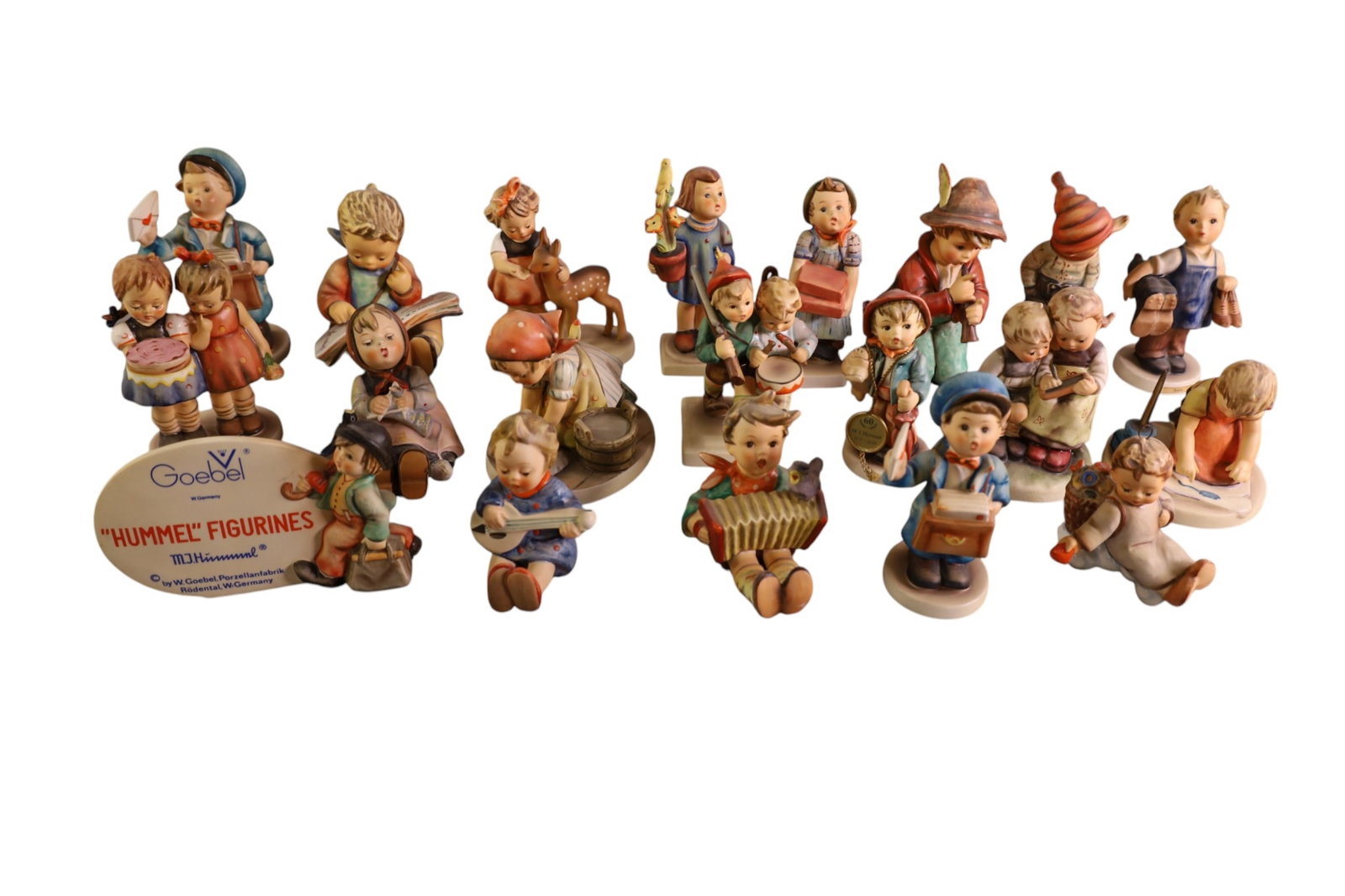 20 HUMMEL FIGURES (1 of 4)