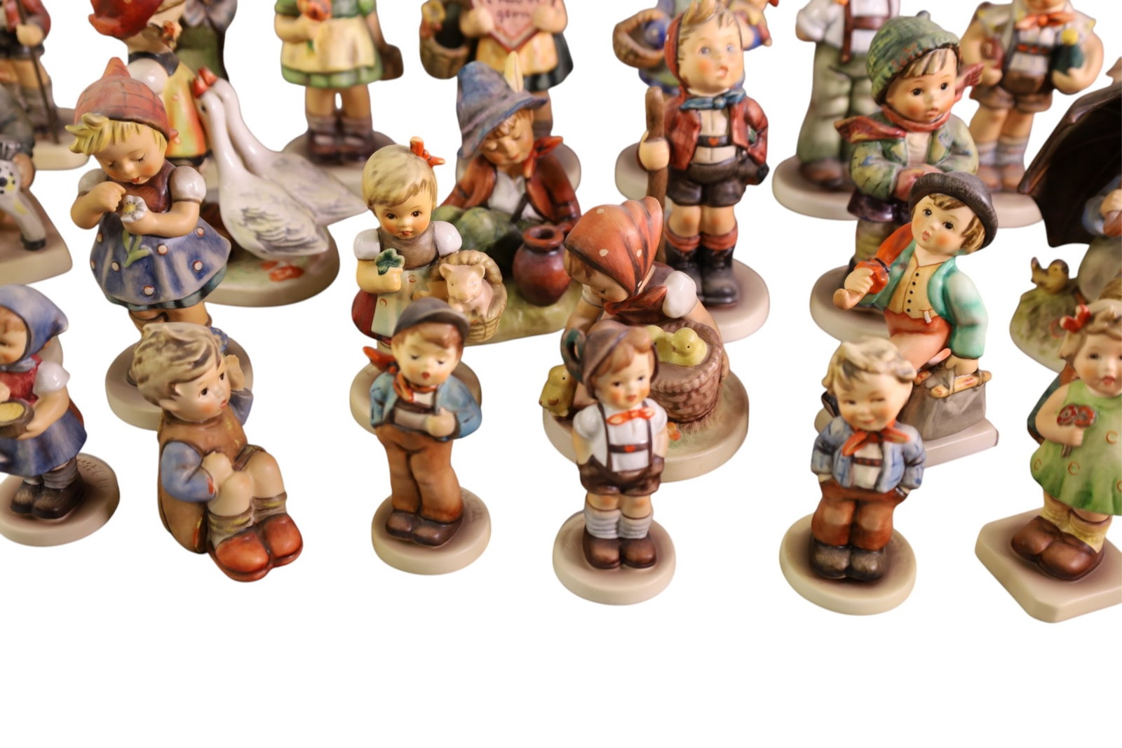 31 HUMMEL FIGURES - 6