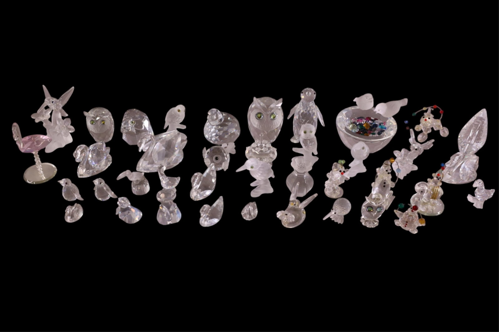 30 SWAROVSKI CRYSTAL FIGURES: OWLS, BIRDS, FISH, AND MORE.