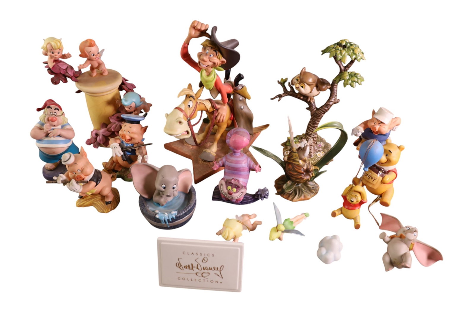 16 DISNEY FIGURES: WALT DISNEY CLASSICS COLLECTION, PETER PAN, AND MORE.