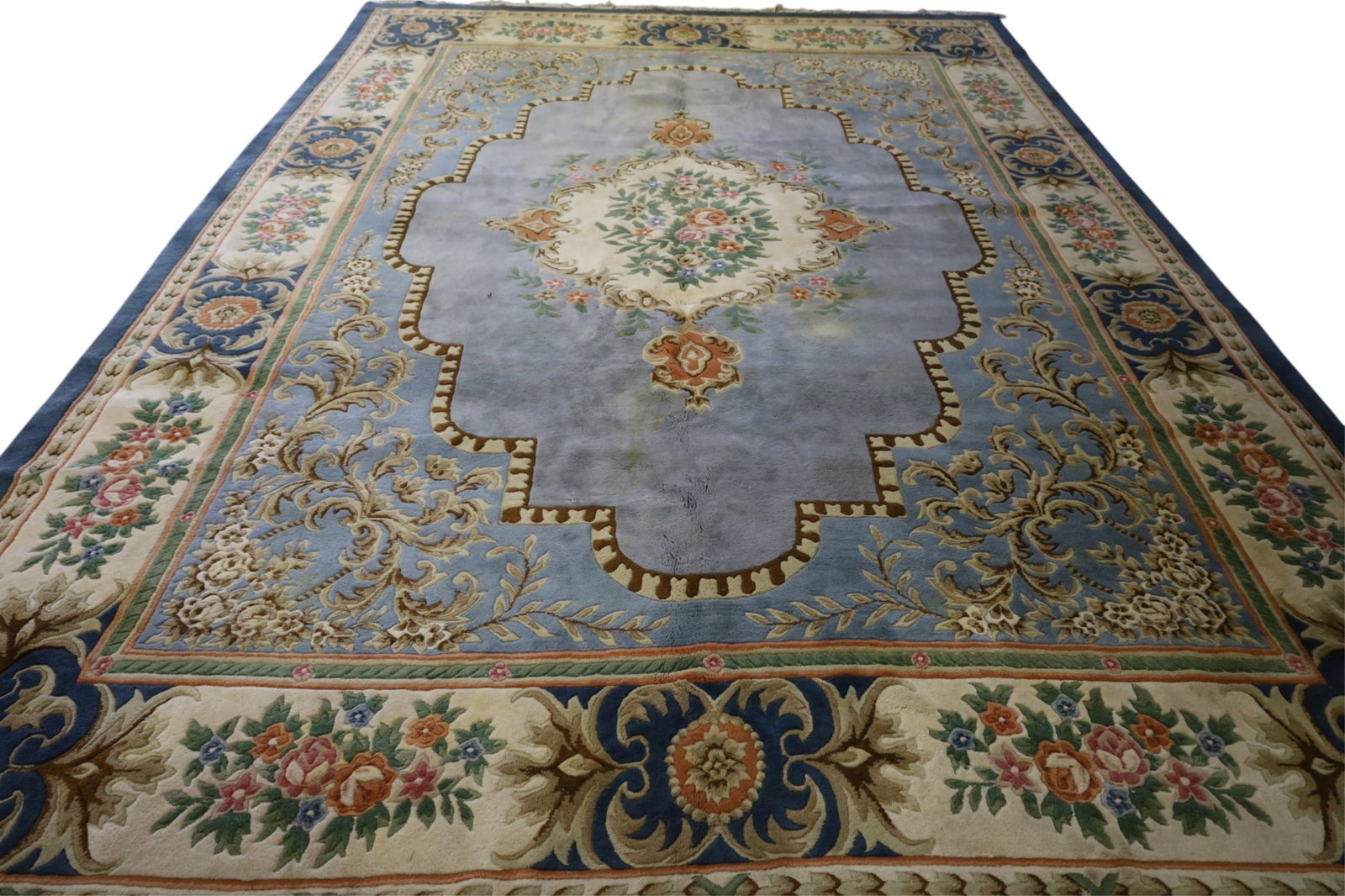 APPROX 10' x 14' HANDMADE WOOL RUG: CHINESE WOOL RUG, STAINS, NEEDS CLEANED.