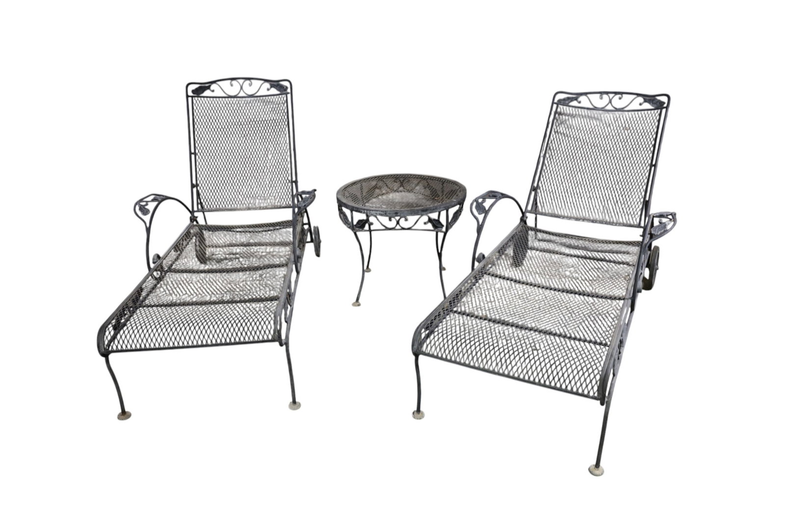 3 PIECE PATIO SET: VINTAGE PATIO CHAISE LOUNGE CHAIRS, SMALL SIDE TABLE, FLORAL DECORATED. PAINT LOSS. MISSING RUBBER ON WHEELS. 30" W x 58" L. x 40" H. THIS ITEM EXCEEDS SIZE LIMITATIONS FOR IN HOUSE SHIPPING, MUST BE