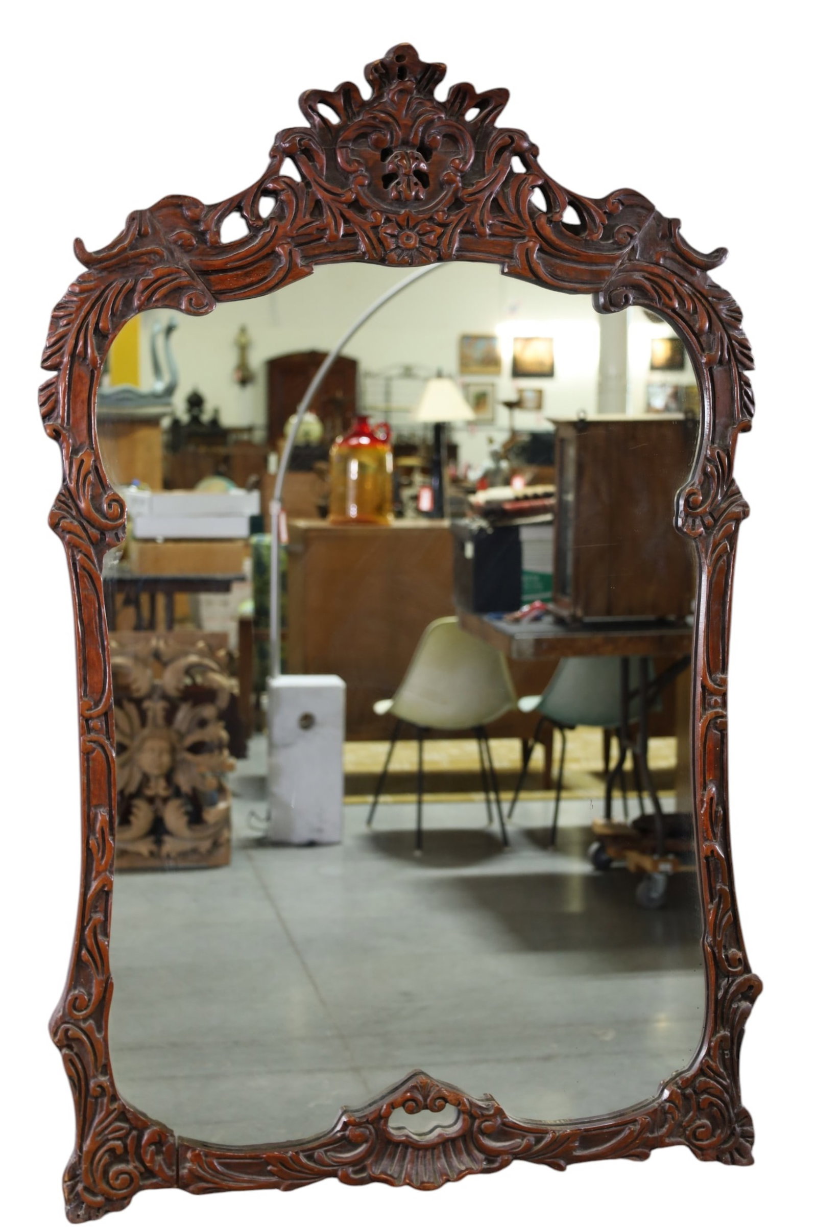 CARVED MAHOGANY WALL MIRROR: CARVED MAHOGANY WALL MIRROR, MINOR WEAR TO FINISH. 27" X 43" THIS ITEM EXCEEDS SIZE LIMITATIONS FOR IN HOUSE SHIPPING, MUST BE PICKED UP IN HOUSE OR SHIPPED VIA 3rd PARTY GROUND SHIPPER.