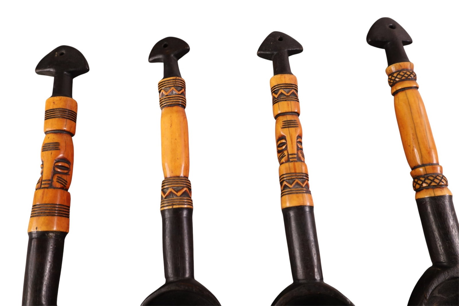 CARVED AFRICAN UTENSILS - 2