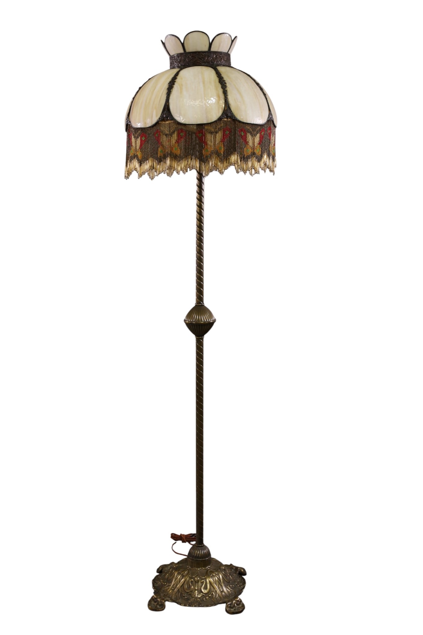 SLAG GLASS FLOOR LAMP: BRASS BASE SLAG GLASS FLOOR LAMP. 18" W x 69" H. THIS ITEM EXCEEDS SIZE LIMITATIONS FOR IN HOUSE SHIPPING, MUST BE SHIPPED VIA 3rd PARTY GROUND SHIPPER OR PICKED UP IN HOUSE.