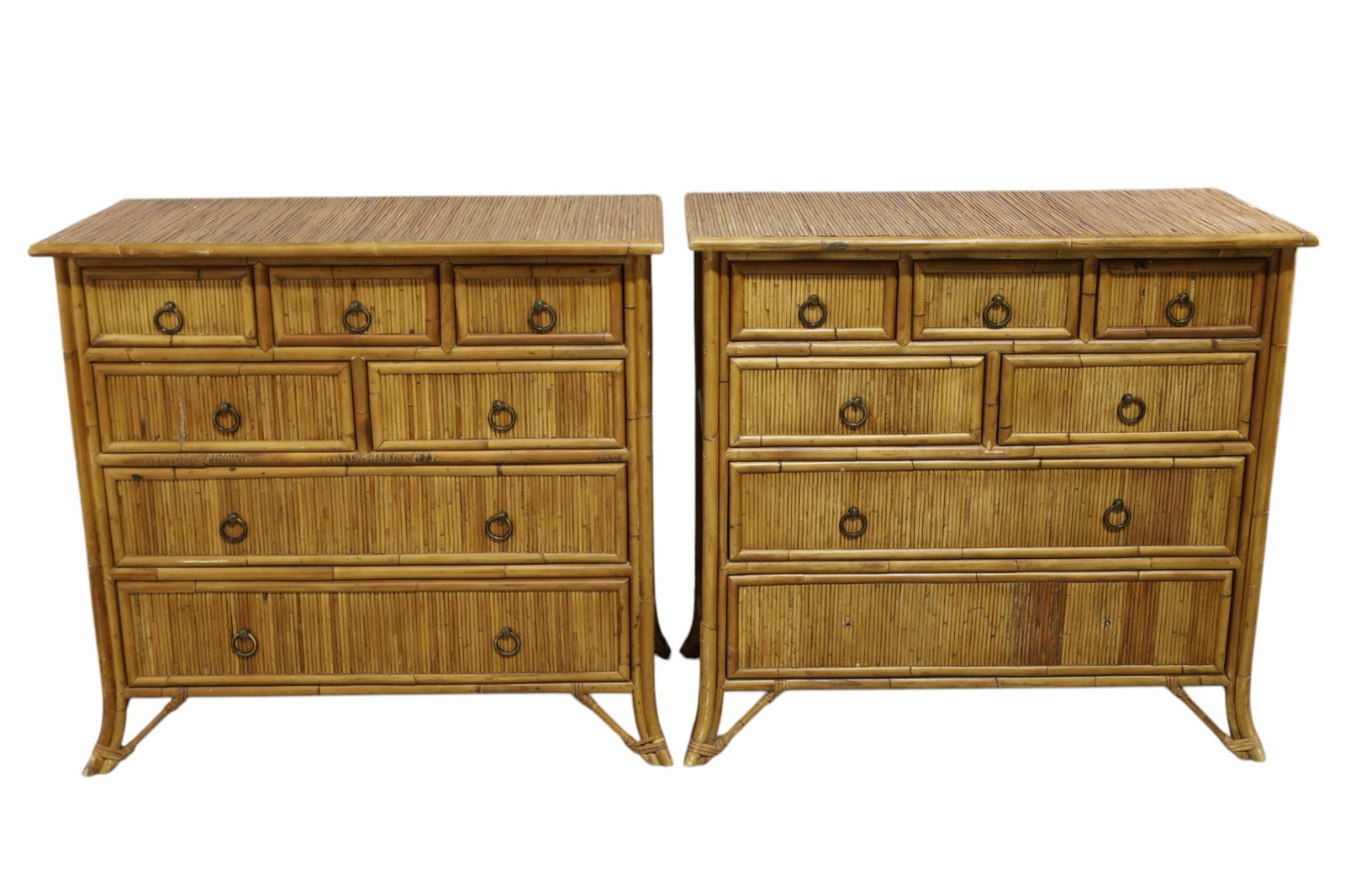 PAIR OF BAKER MILLING ROAD CHESTS: PAIR OF BAKER FURNITURE, MILLING ROAD, 7 DRAWER CHESTS, BAMBOO FRAMED, PENCIL REED PANELS. MISSING 2 DRAWER PULLS. 38" W x 19" D x 36" H. THIS ITEM EXCEEDS SIZE LIMITATIONS FOR IN HOUSE SHIPPING, MUST