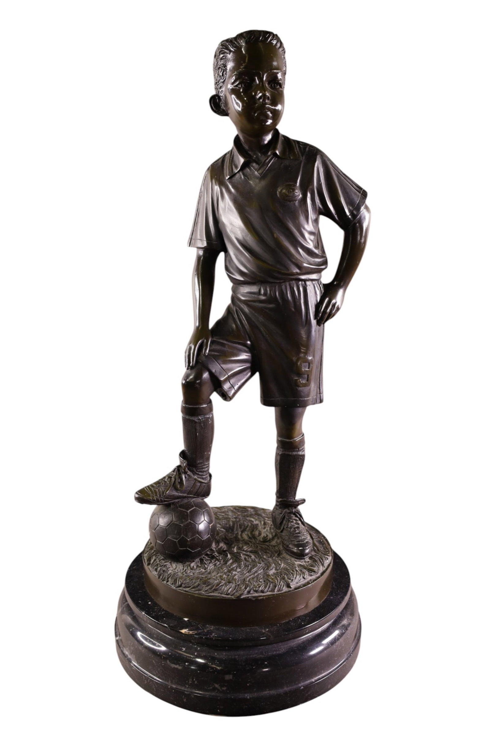JIM DAVIDSON BRONZE: BOY SOCCER BRONZE ON MARBLE BASE, SIGNED JIM DAVIDSON. TITLED SOCCER BOY. 26" H. THIS ITEM EXCEEDS SIZE LIMITATIONS FOR IN HOUSE SHIPPING, MUST BE SHIPPED VIA 3rd PARTY GROUND SHIPPER OR PICKED UP IN