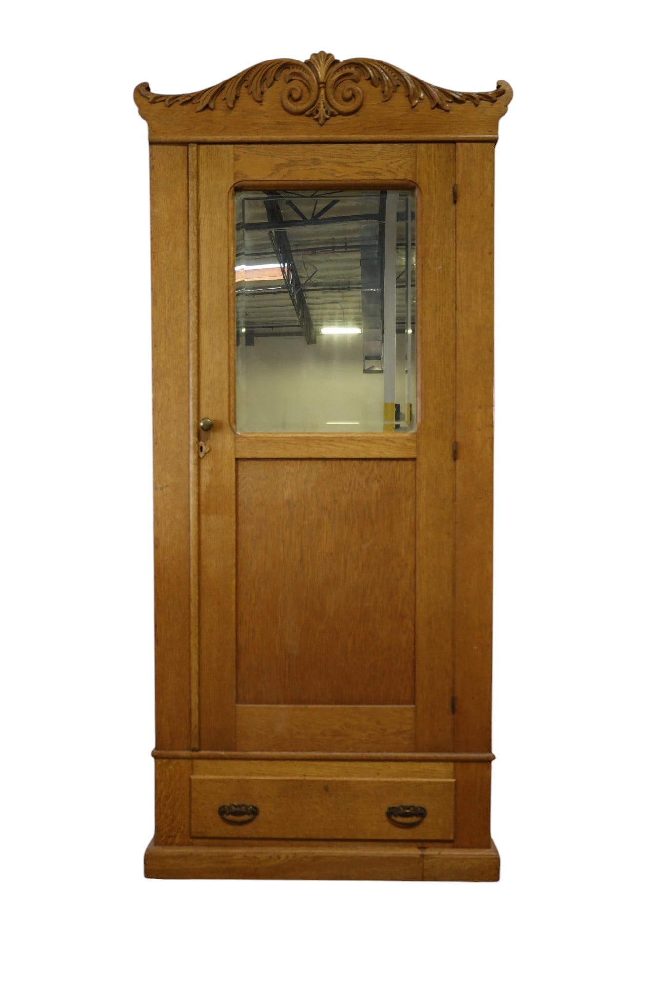 1900'S NARROW OAK ARMOIRE: SINGLE DOOR, BEVELED MIRROR FRONT, LOWER DRAWER, NARROW OAK ARMOIRE. 36" W x 16" D x 77" H. THIS ITEM EXCEEDS SIZE AND WEIGHT LIMITATIONS FOR IN HOUSE SHIPPING, MUST BE PICKED UP IN HOUSE OR SHIPPED